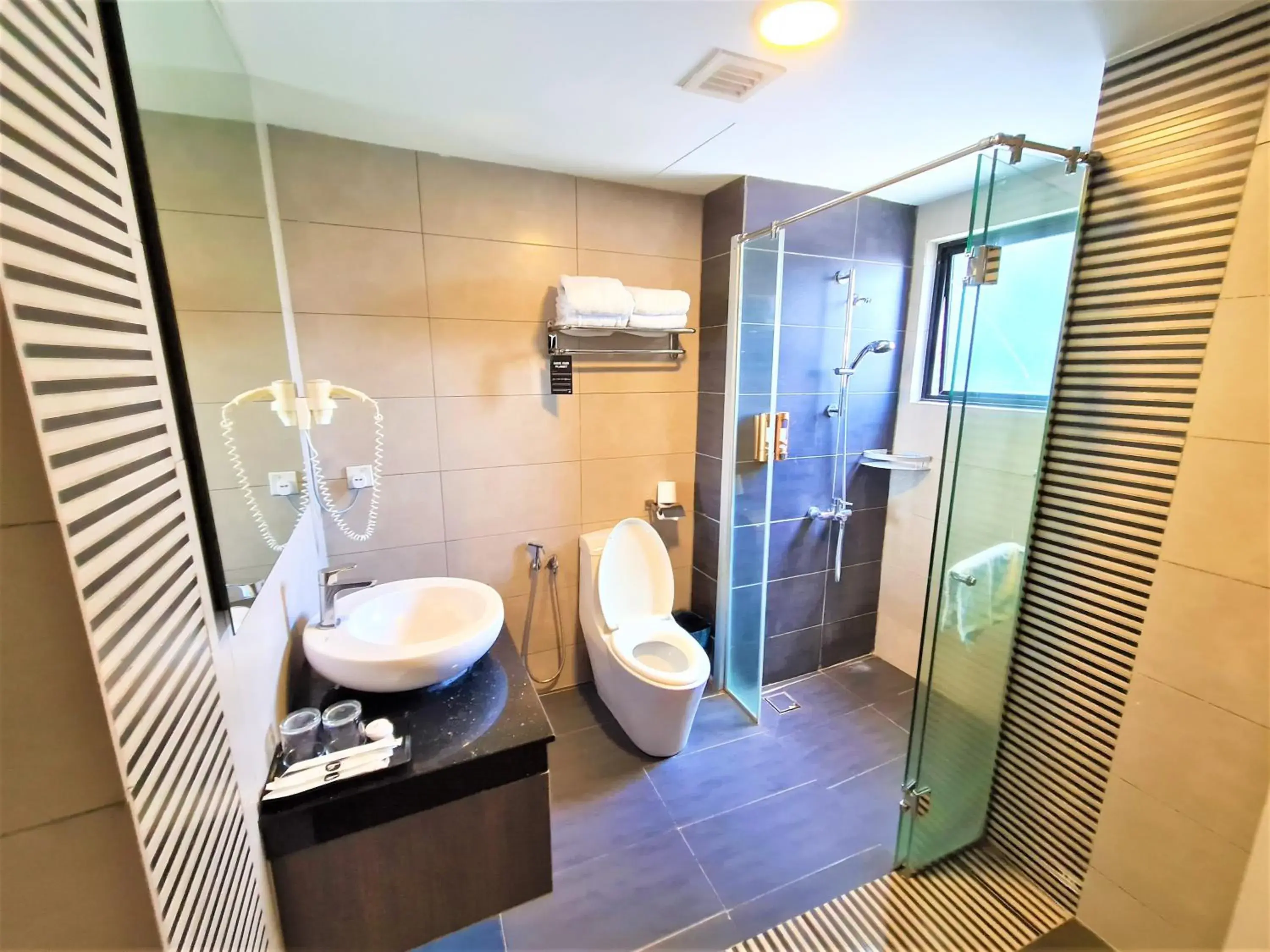 Bathroom in Nexus Regency Suites & Hotel