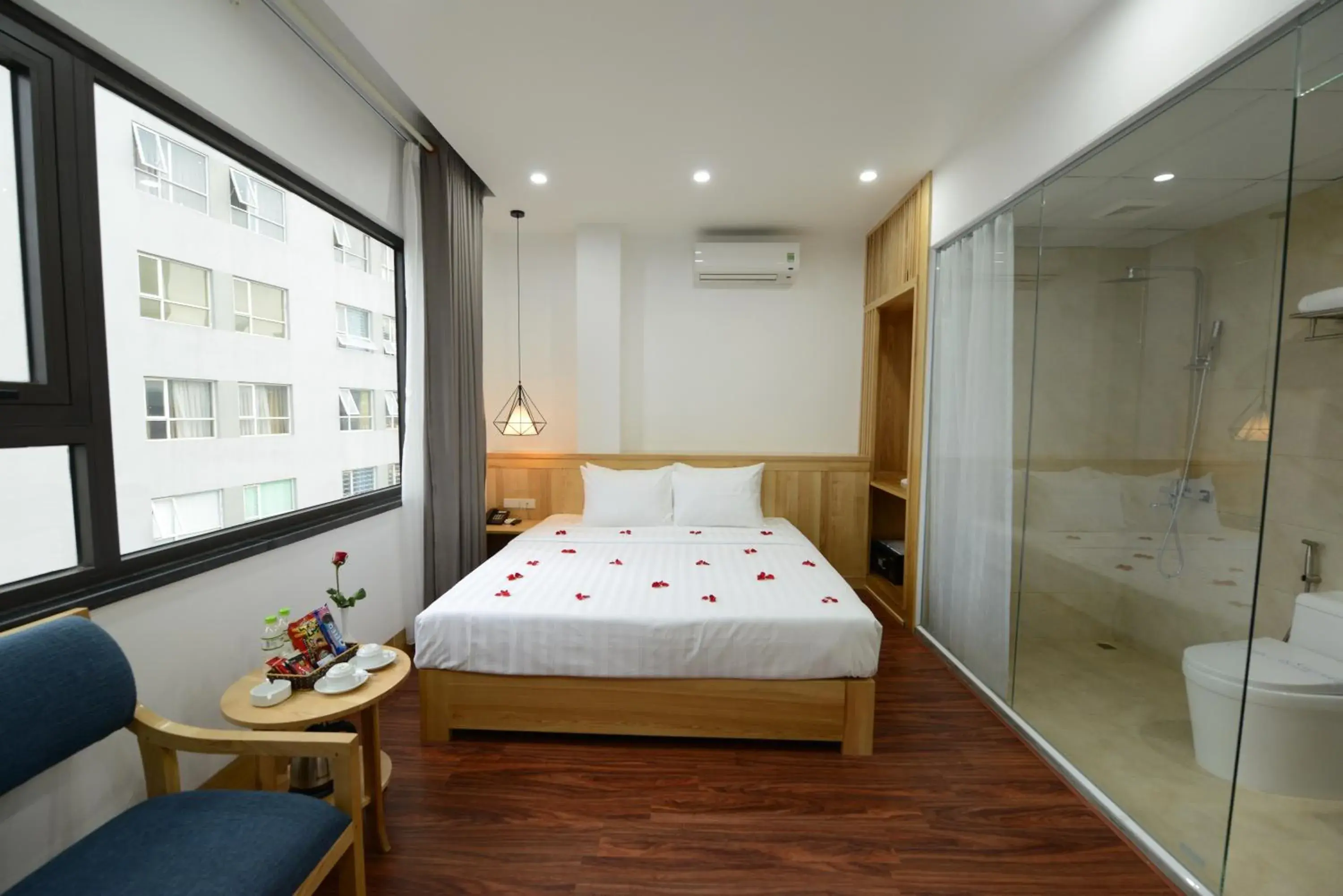 Bed in Blue Hanoi Inn City Hotel