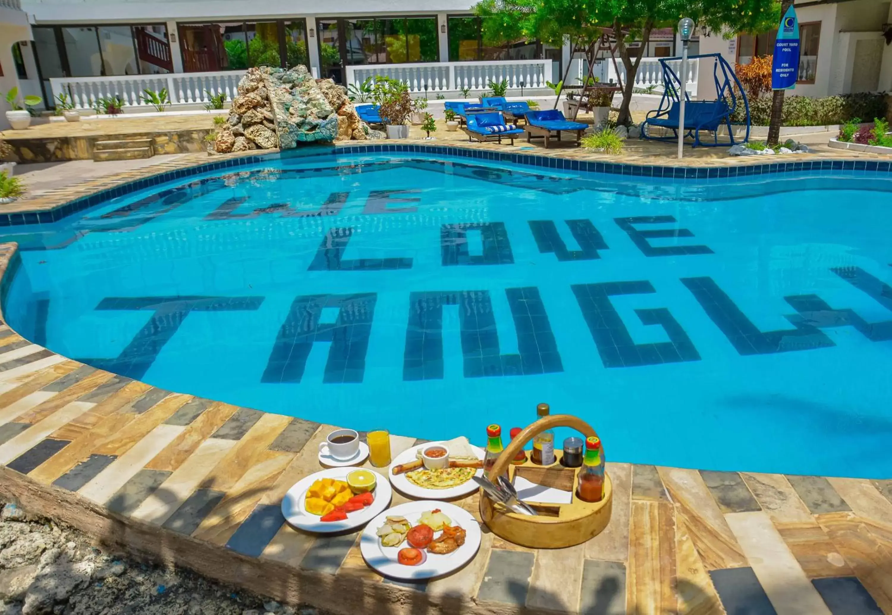 Food close-up, Swimming Pool in Jangwani Sea Breeze Resort