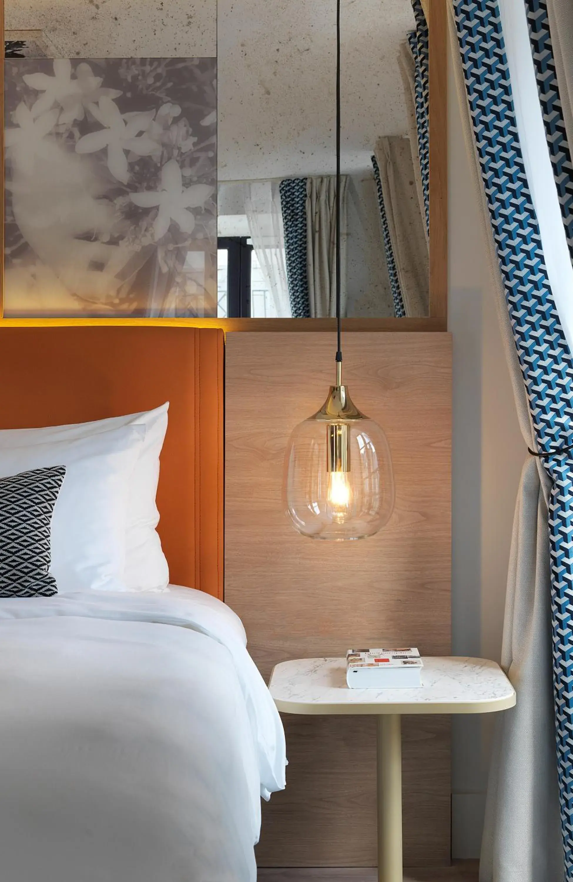 Bed in Renaissance by Marriott Paris Vendome Hotel