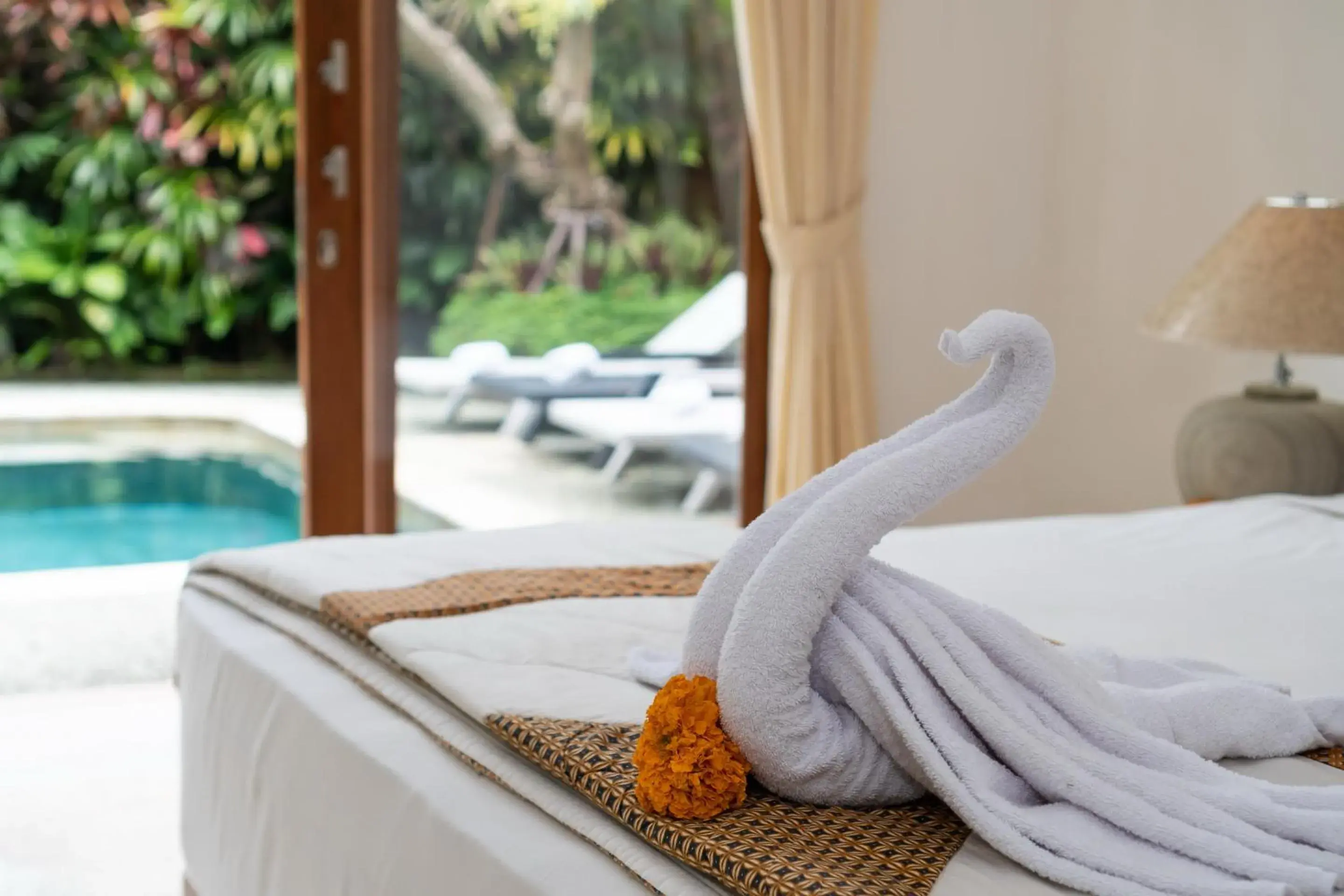 Bed in The Tunjung Ubud Retreat Bed in The Tunjung Ubud Retreat