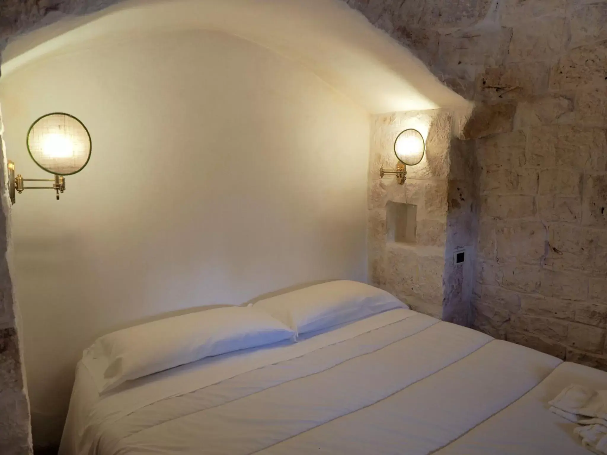 Bed in Relais Trulli Le Icone