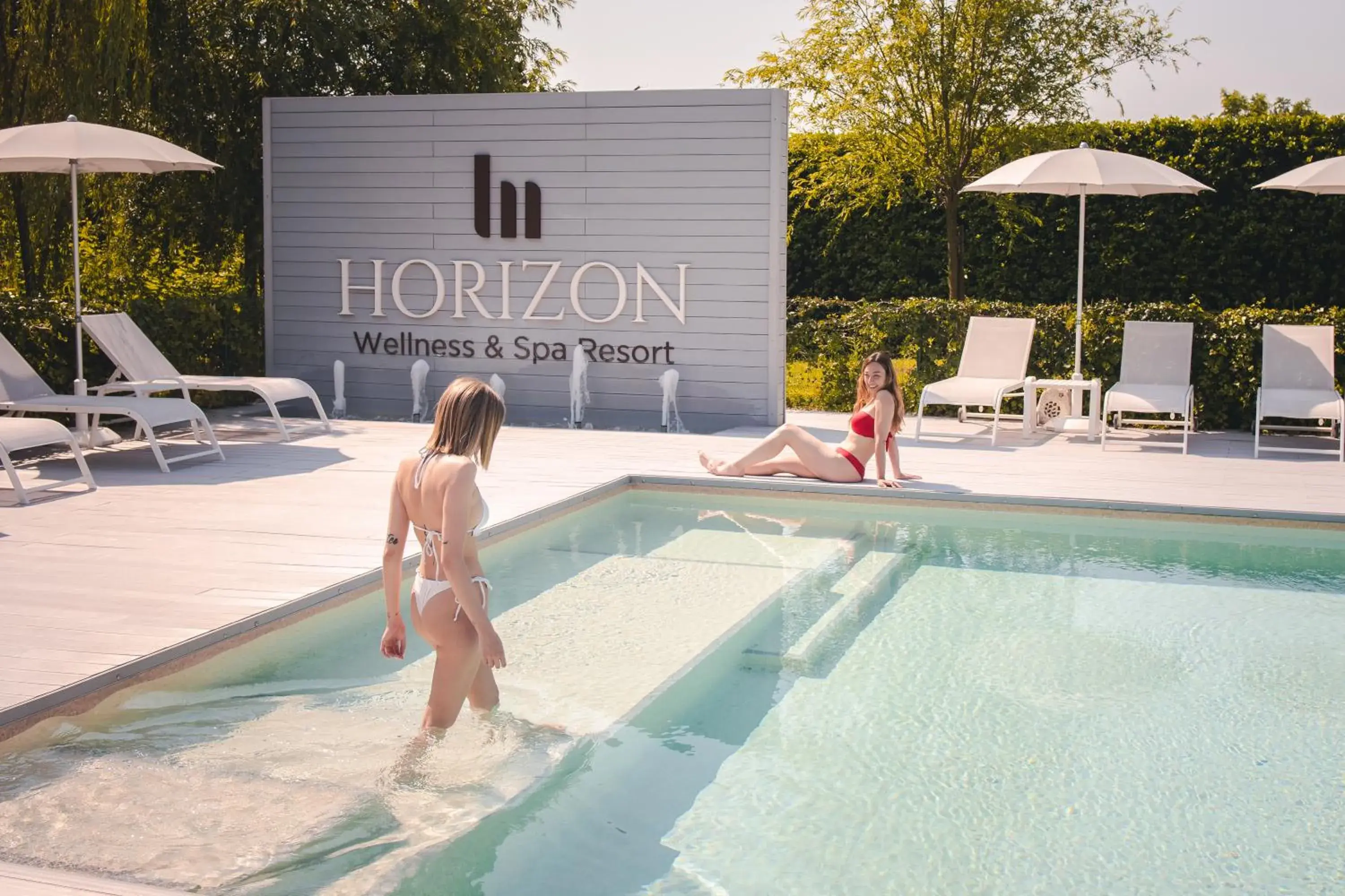 People, Swimming Pool in Hotel Horizon Wellness & Spa Resort; Best Western Signature Collection