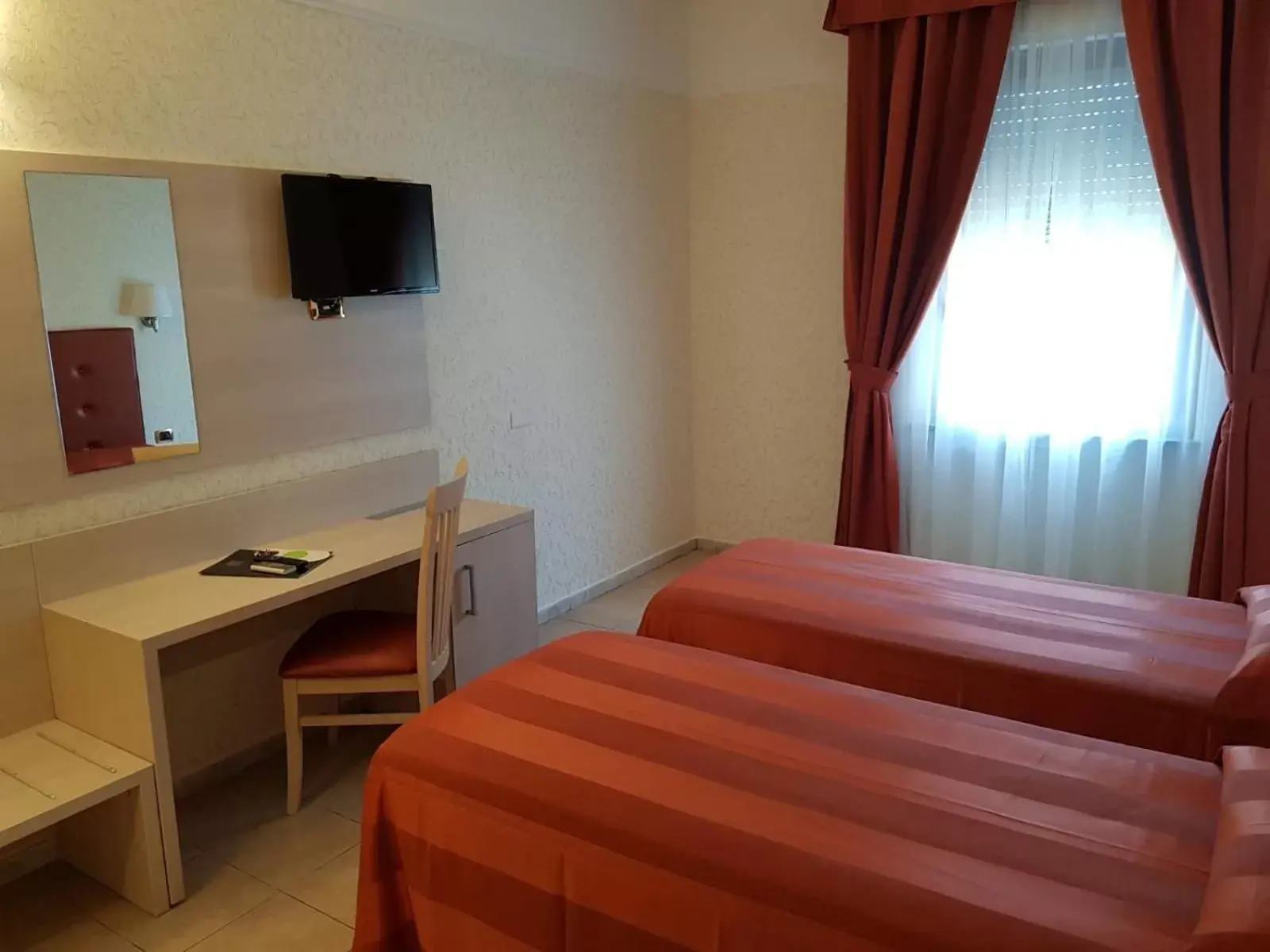 Bed in Hotel Villa Rosa