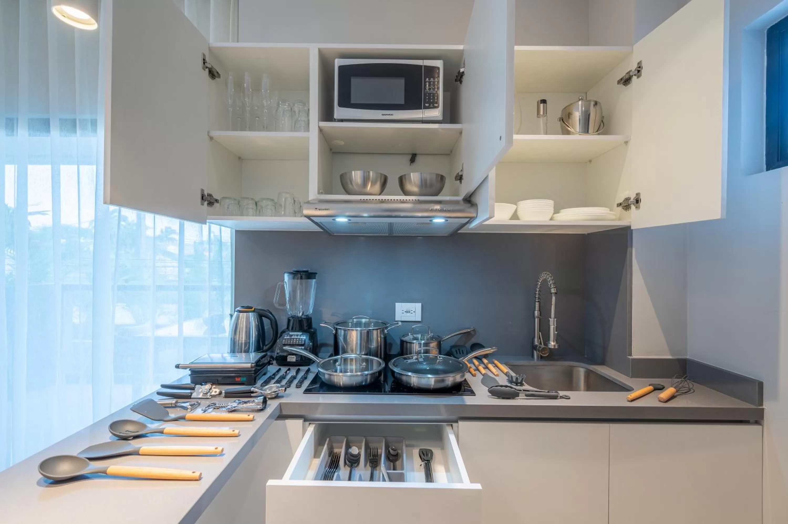 Kitchen or kitchenette in Kippal - Modern Oasis - ApartHotel