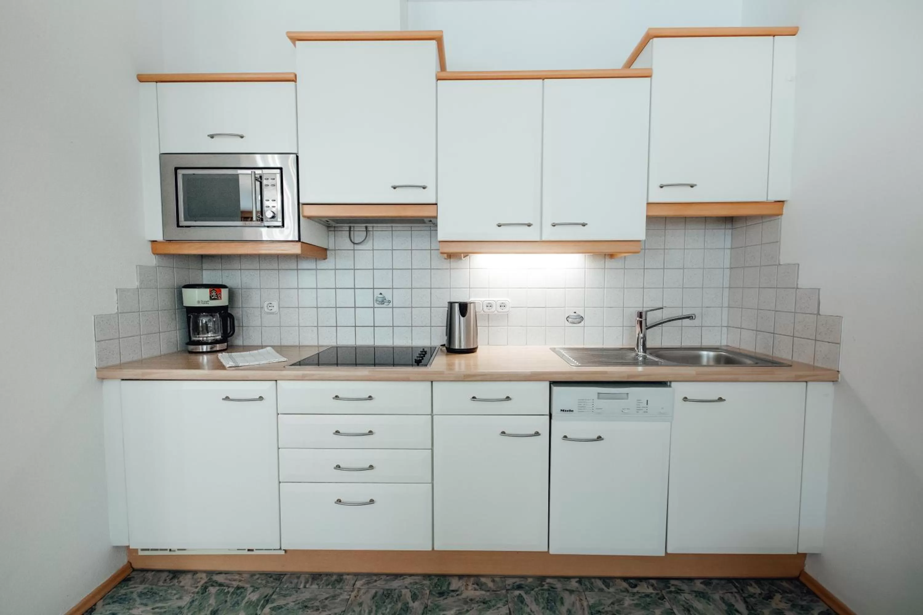 kitchen in Zimmer & Ferienwohnungen Dandler