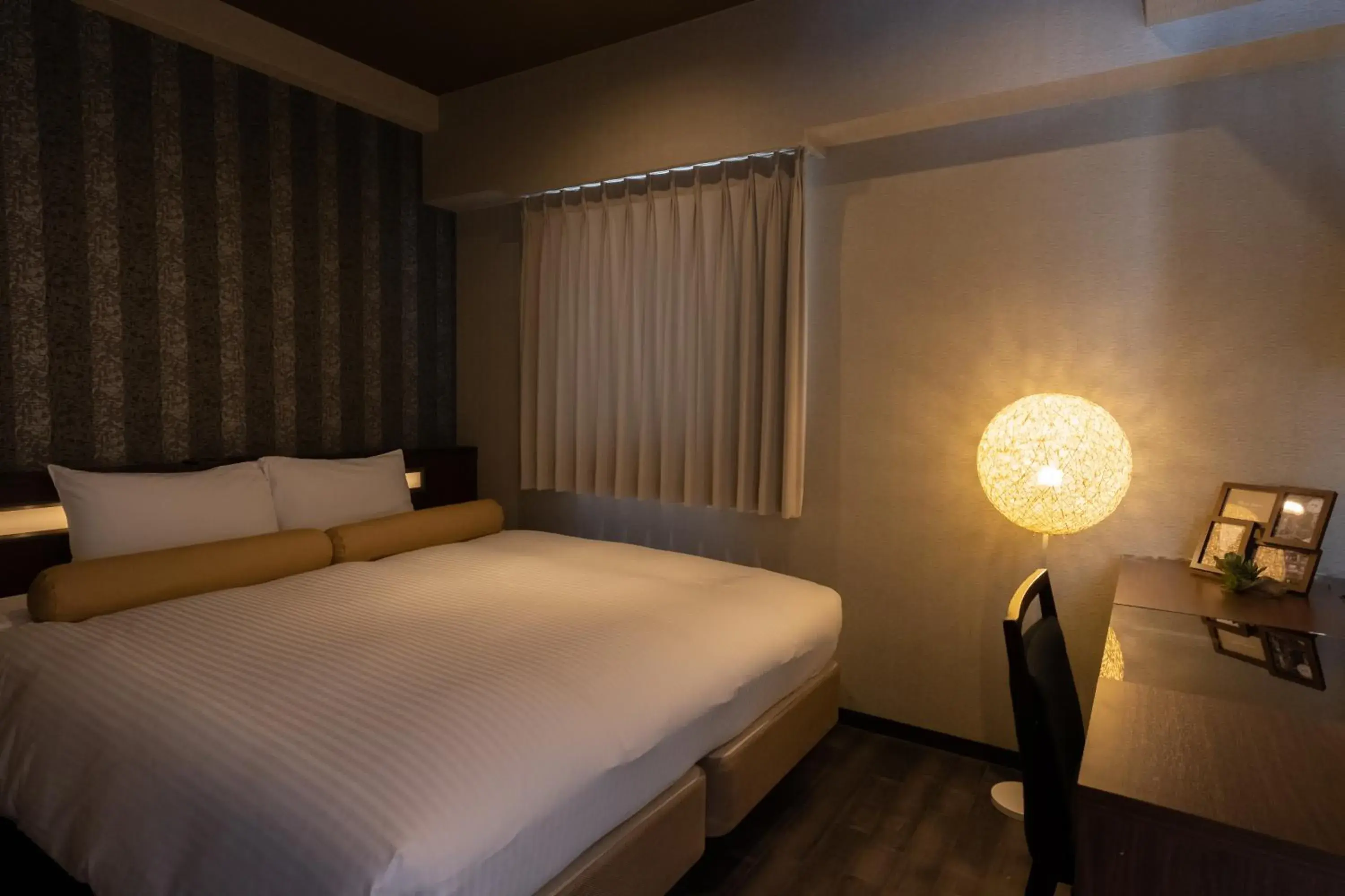 Bed in Nipponbashi Luxe Hotel