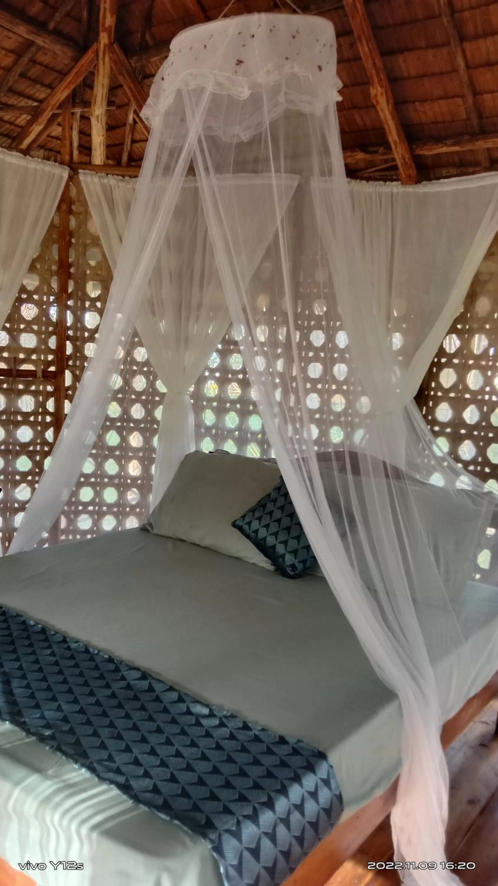 Bed in Prince John Beachfront Eco Bungalows and Restaurant