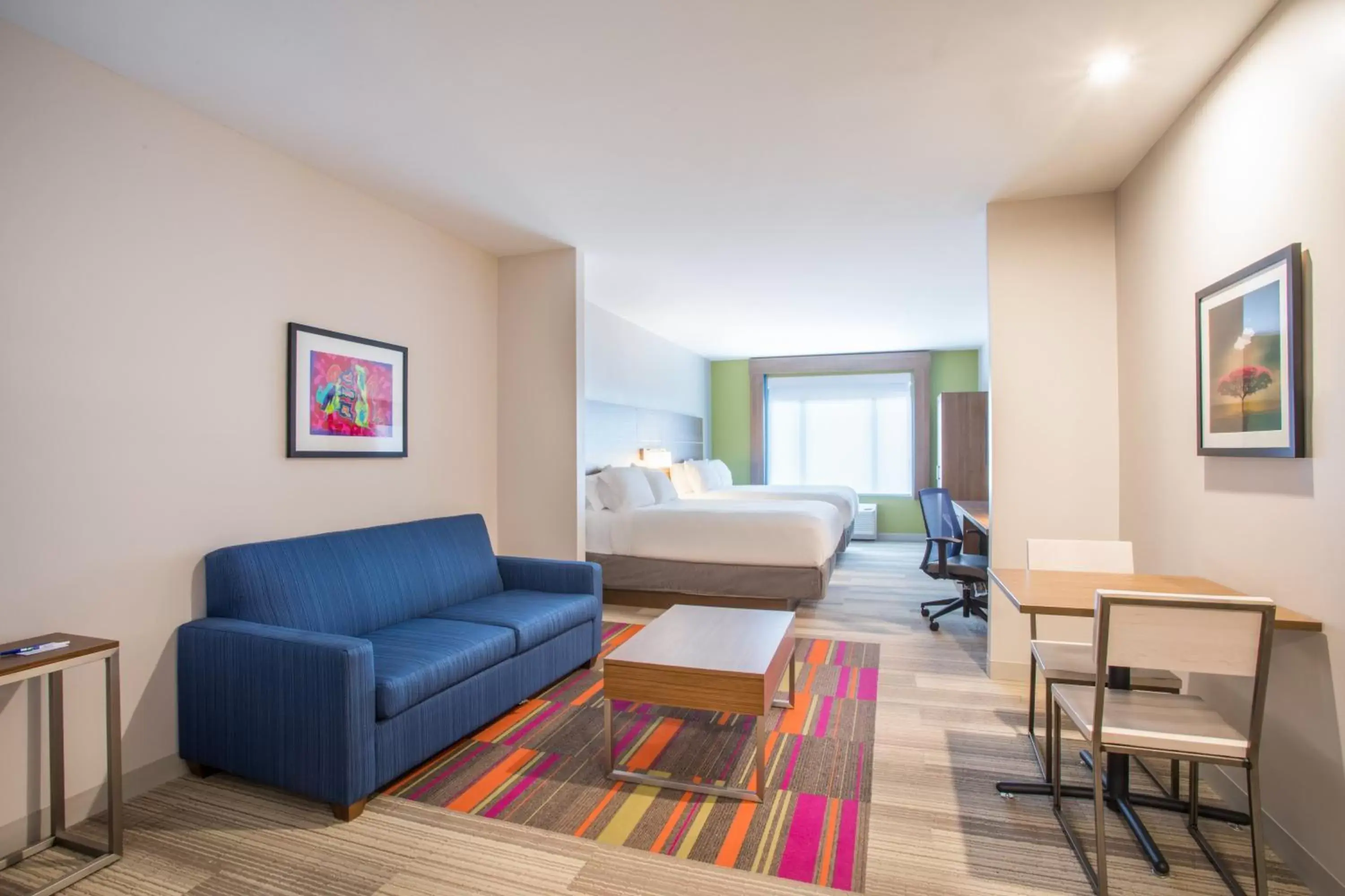 Bedroom, Seating Area in Holiday Inn Express & Suites Owings Mills-Baltimore Area, an IHG Hotel