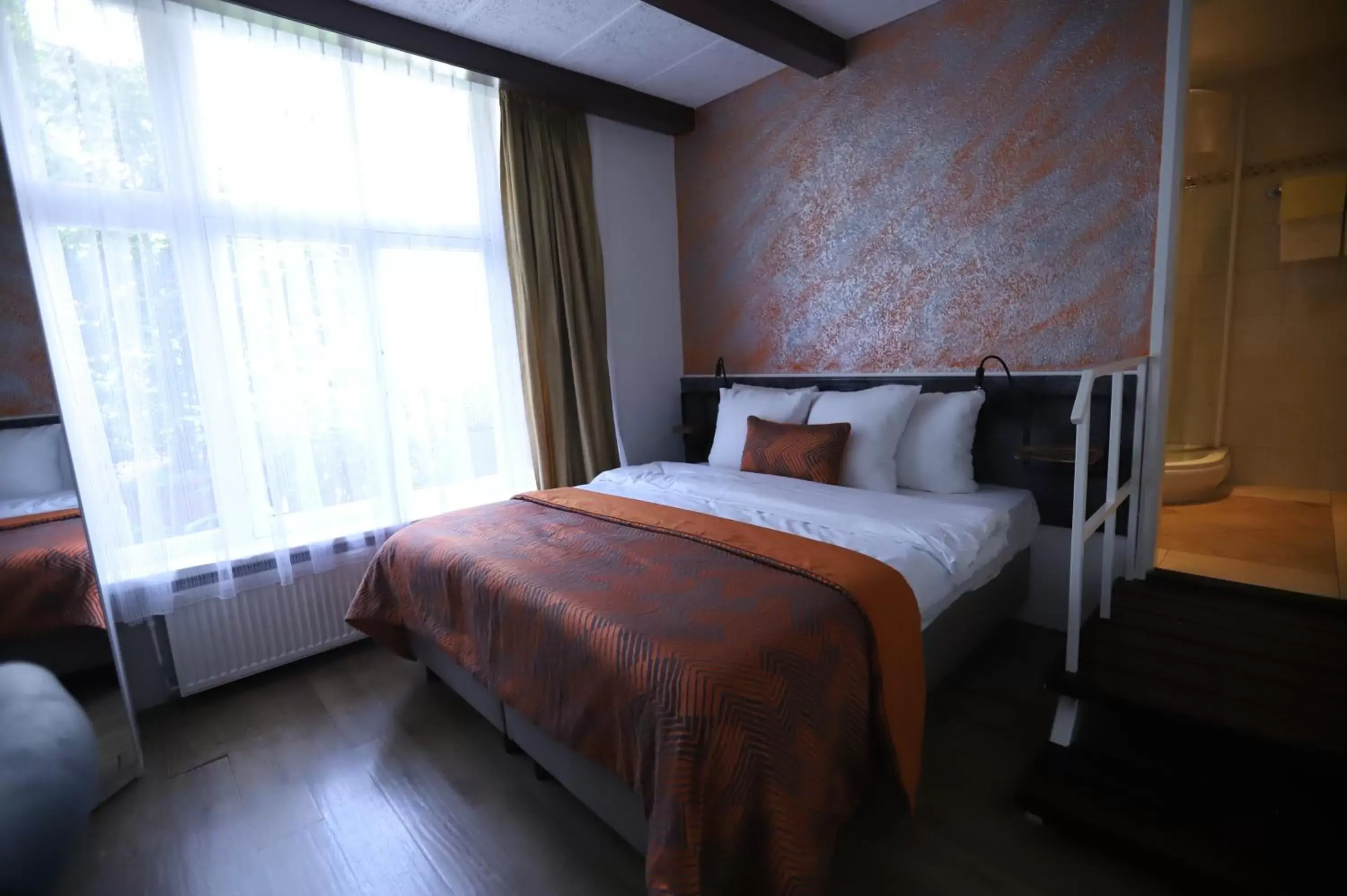Bedroom, Bed in Jupiter Hotel