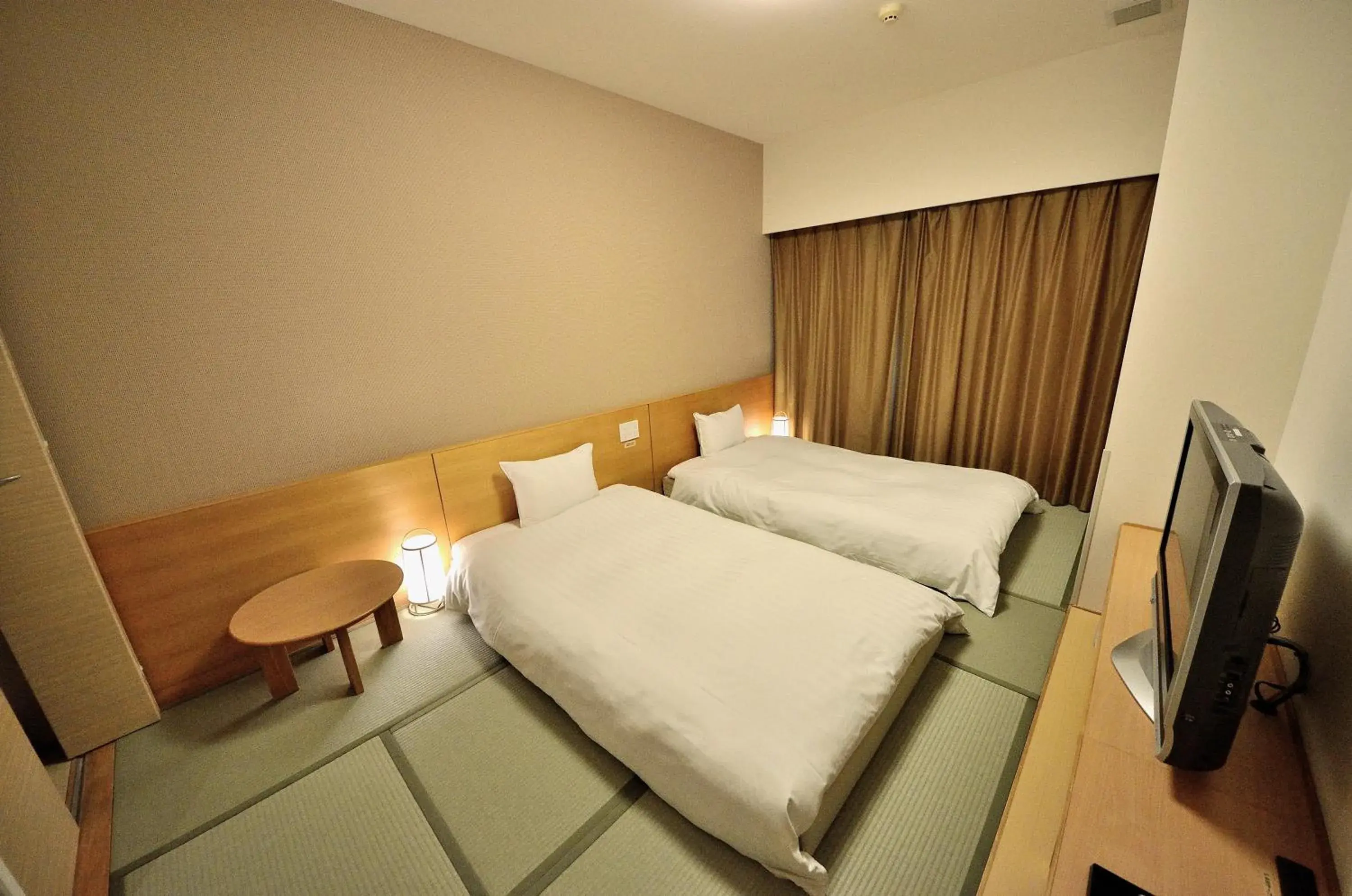 Bed in Dormy Inn Hirosaki Natural Hot Spring