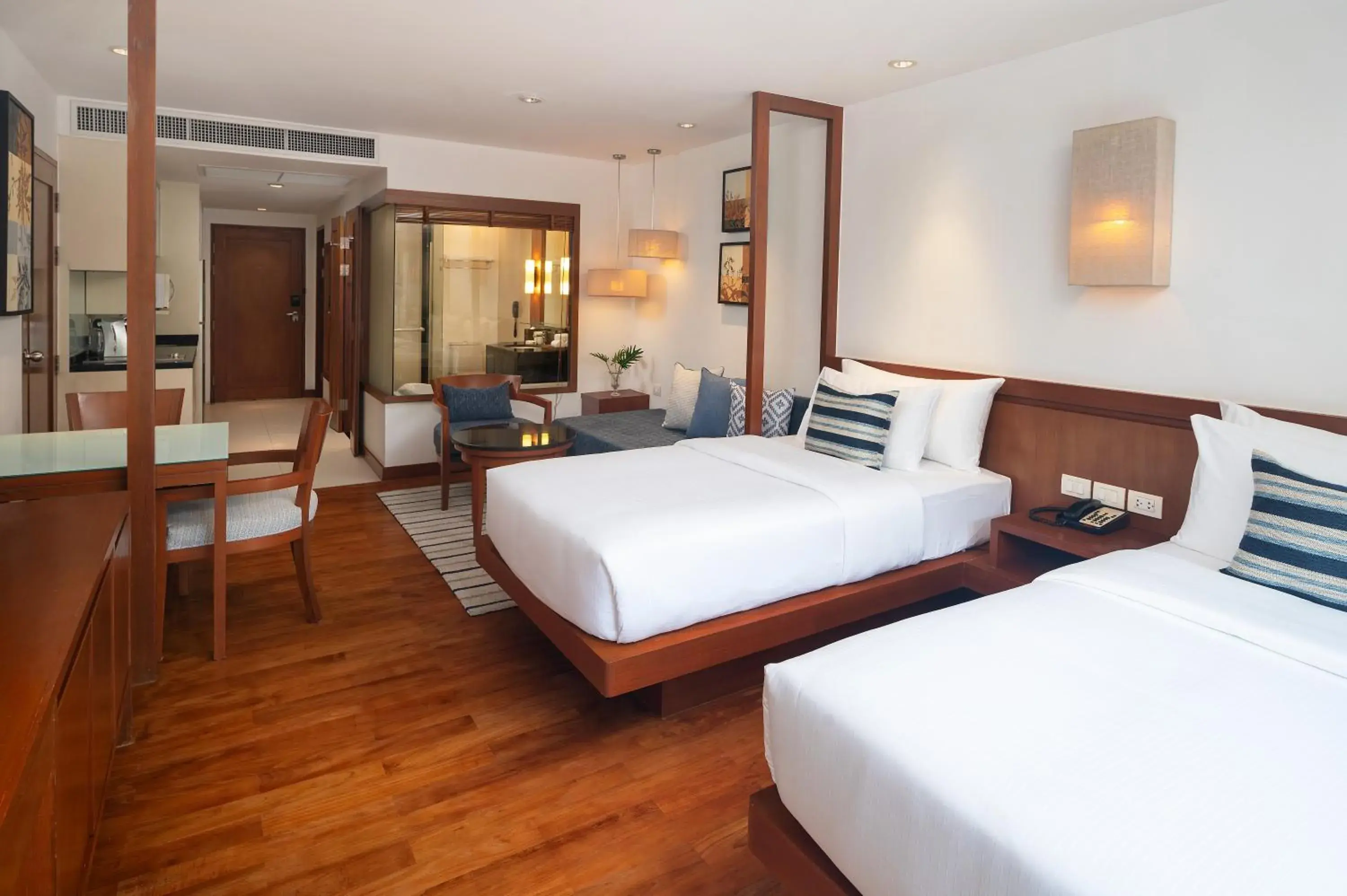Bed in Woodlands Suites Serviced Residences - SHA Extra Plus