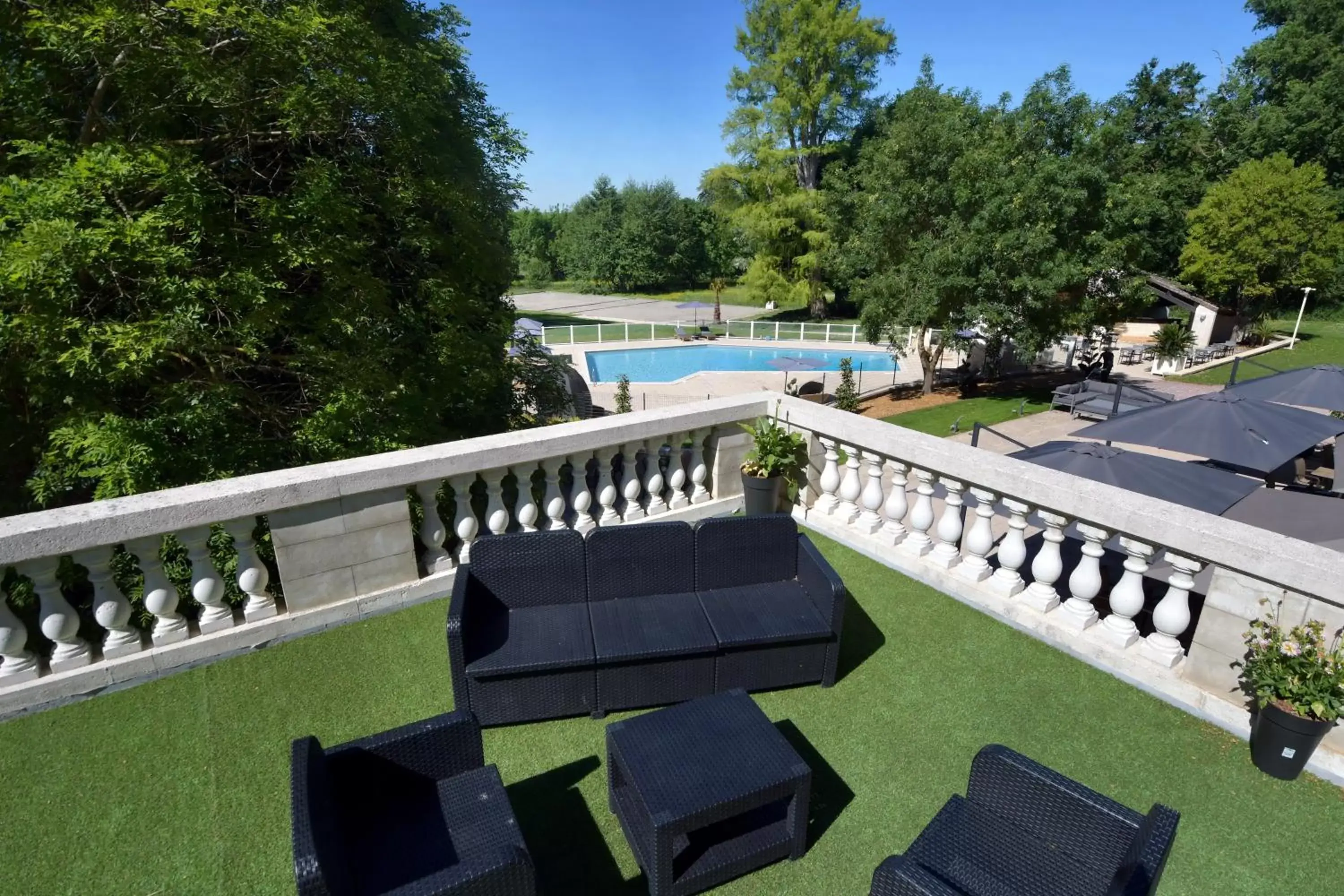 Balcony/Terrace, Pool View in Logis Château Saint Marcel