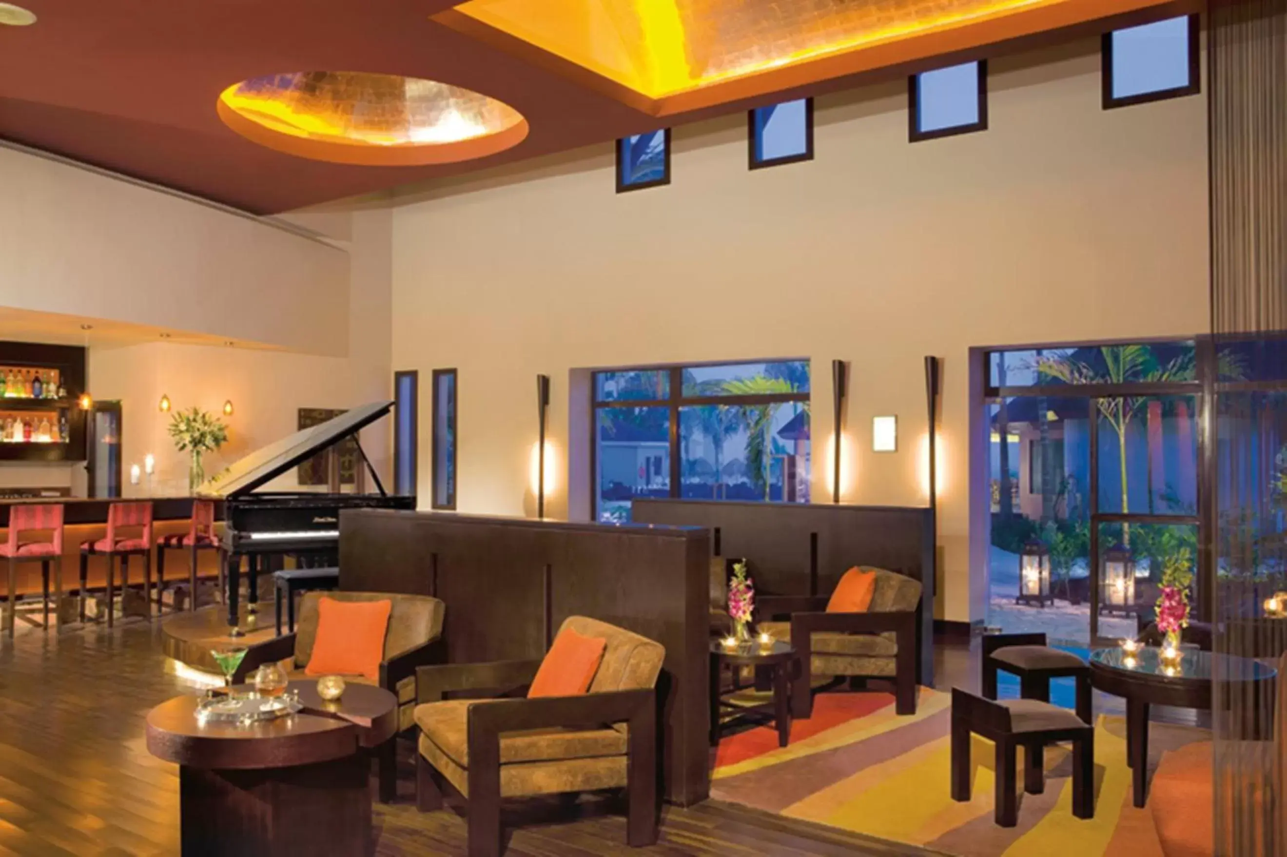 Lounge or bar in Secrets Wild Orchid Lounge or bar in Secrets Wild Orchid