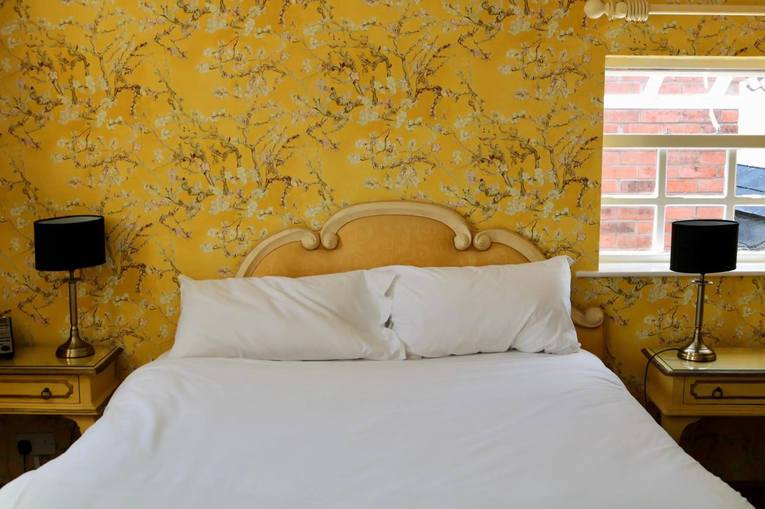 Bed in The Cottage Hotel