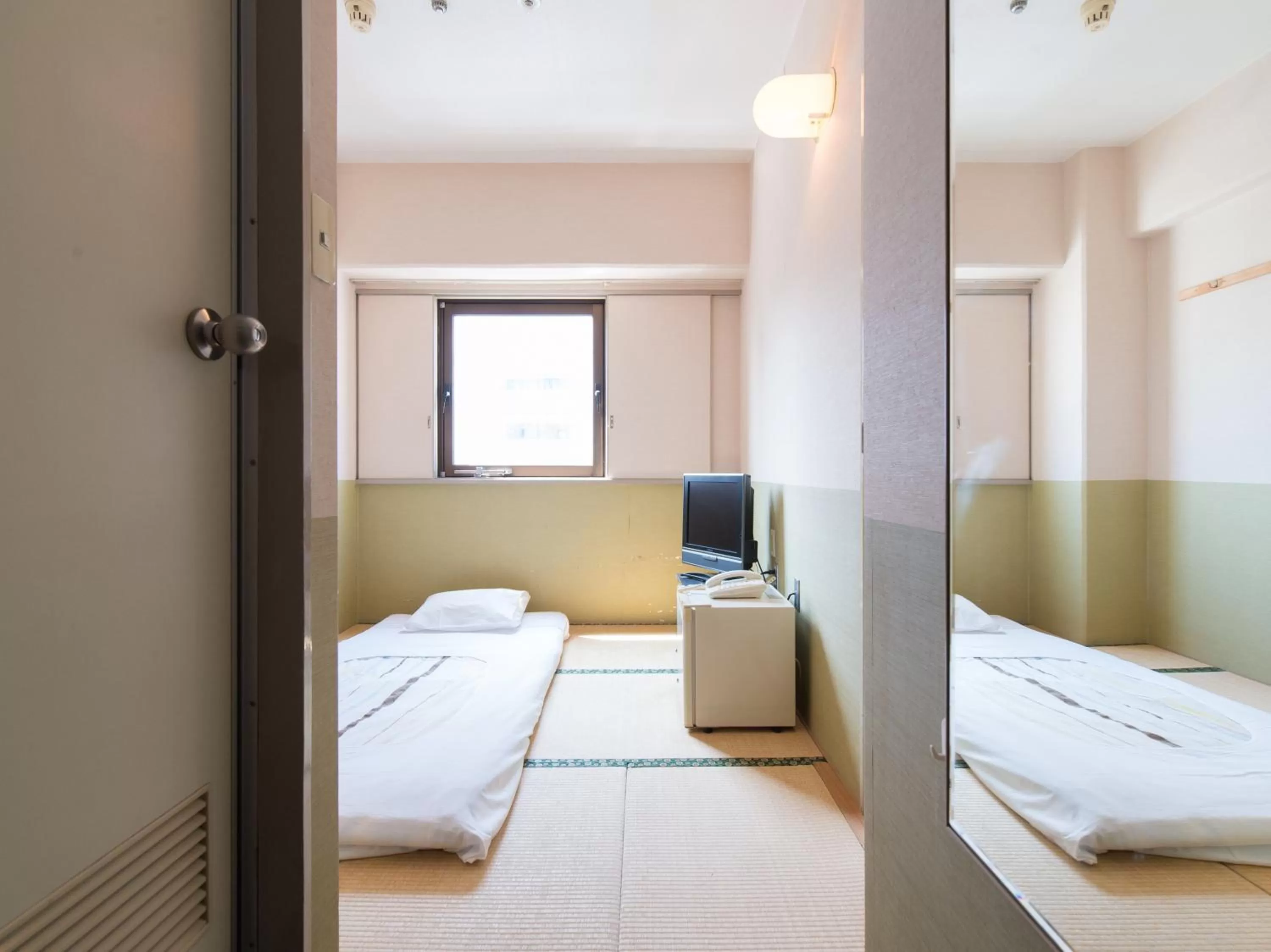 Photo of the whole room, Bed in Tabist Hotel Tetora Kitakyushu