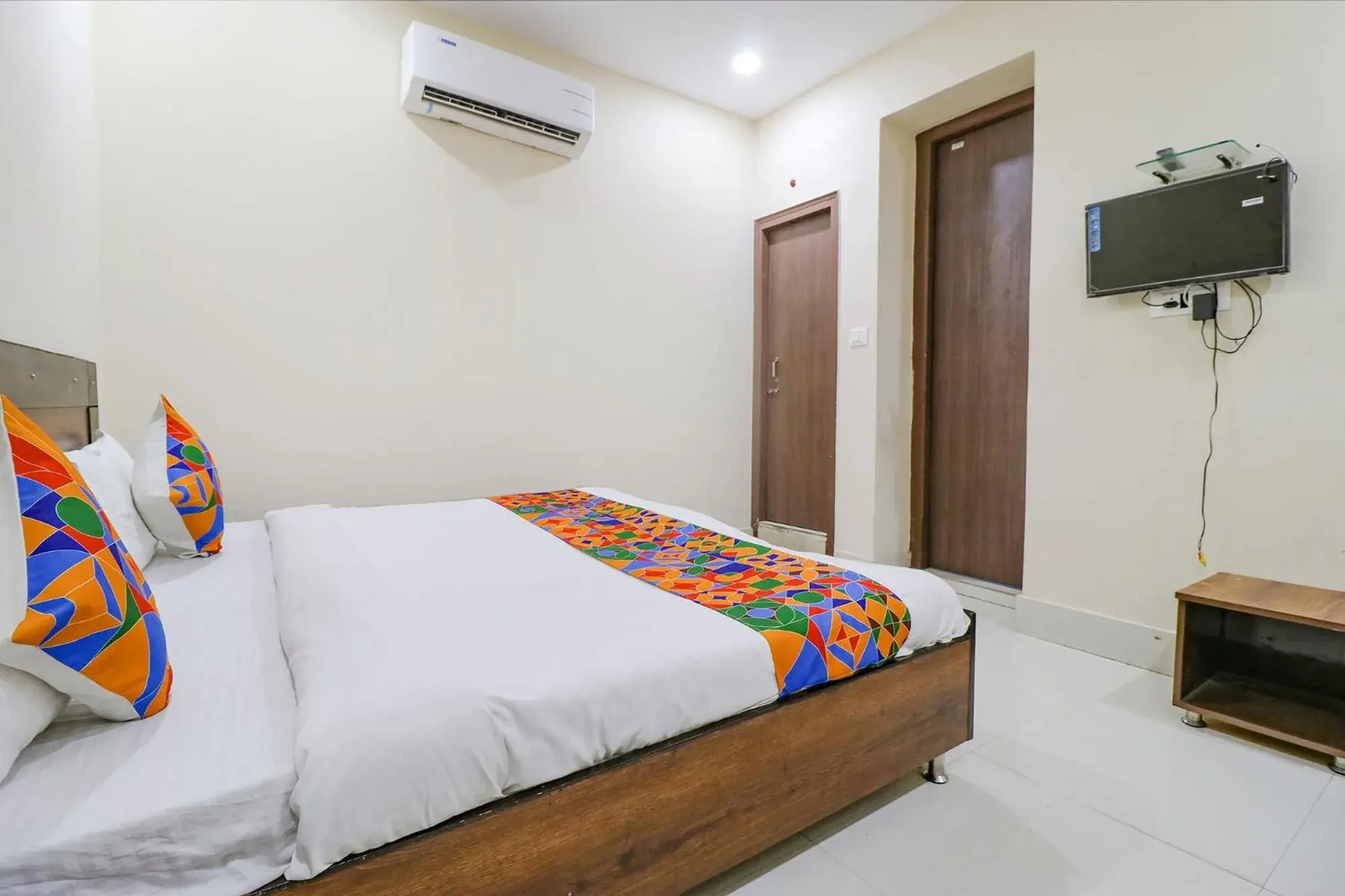 Bed in FabExpress Kartikey Inn