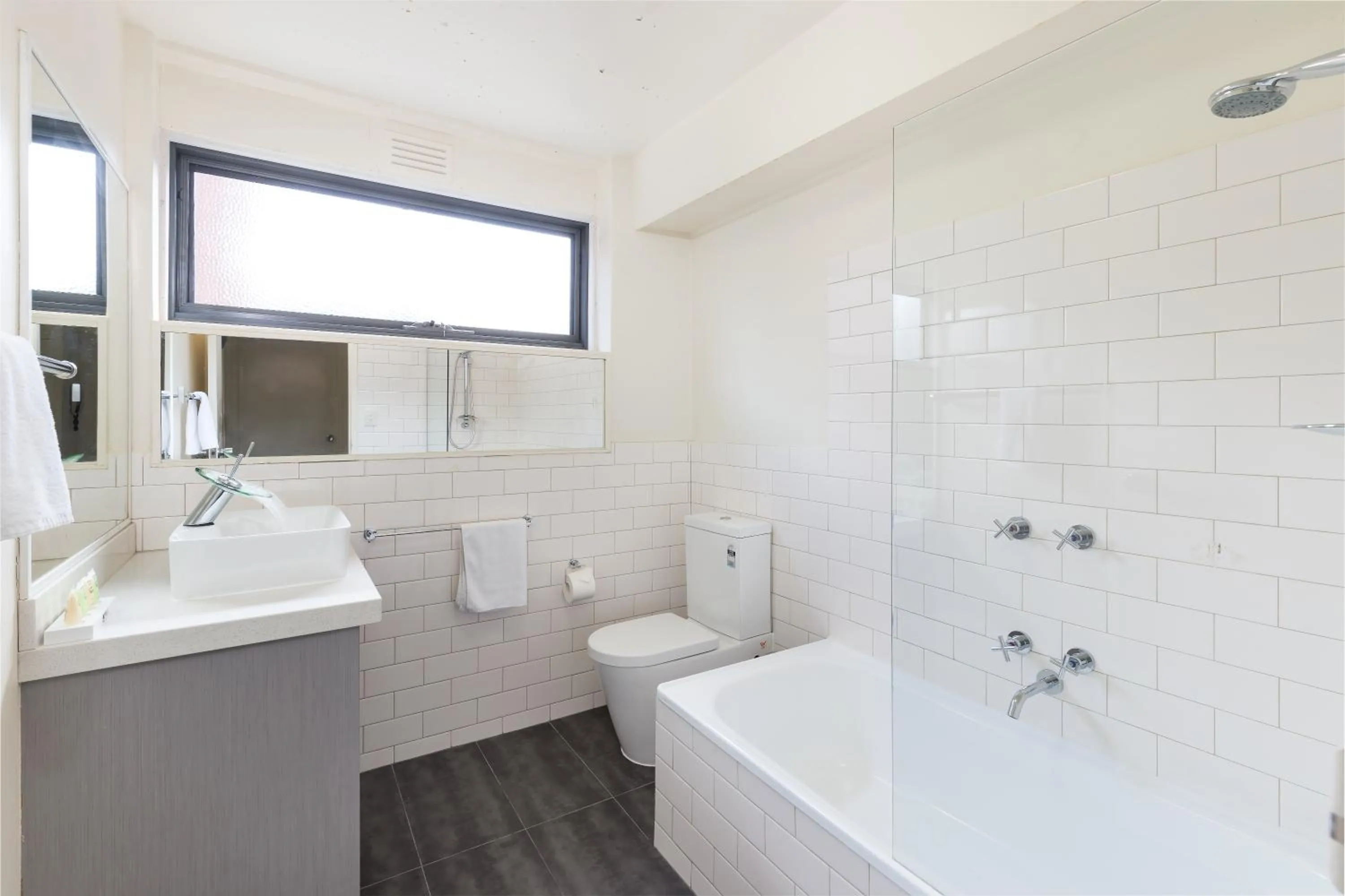 Bathroom in City Edge East Melbourne Apartment Hotel