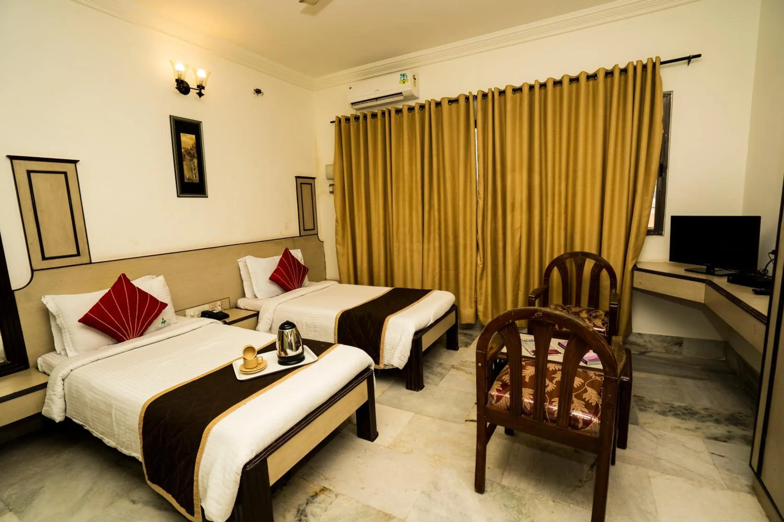 Bed in Hotel Mangalore International