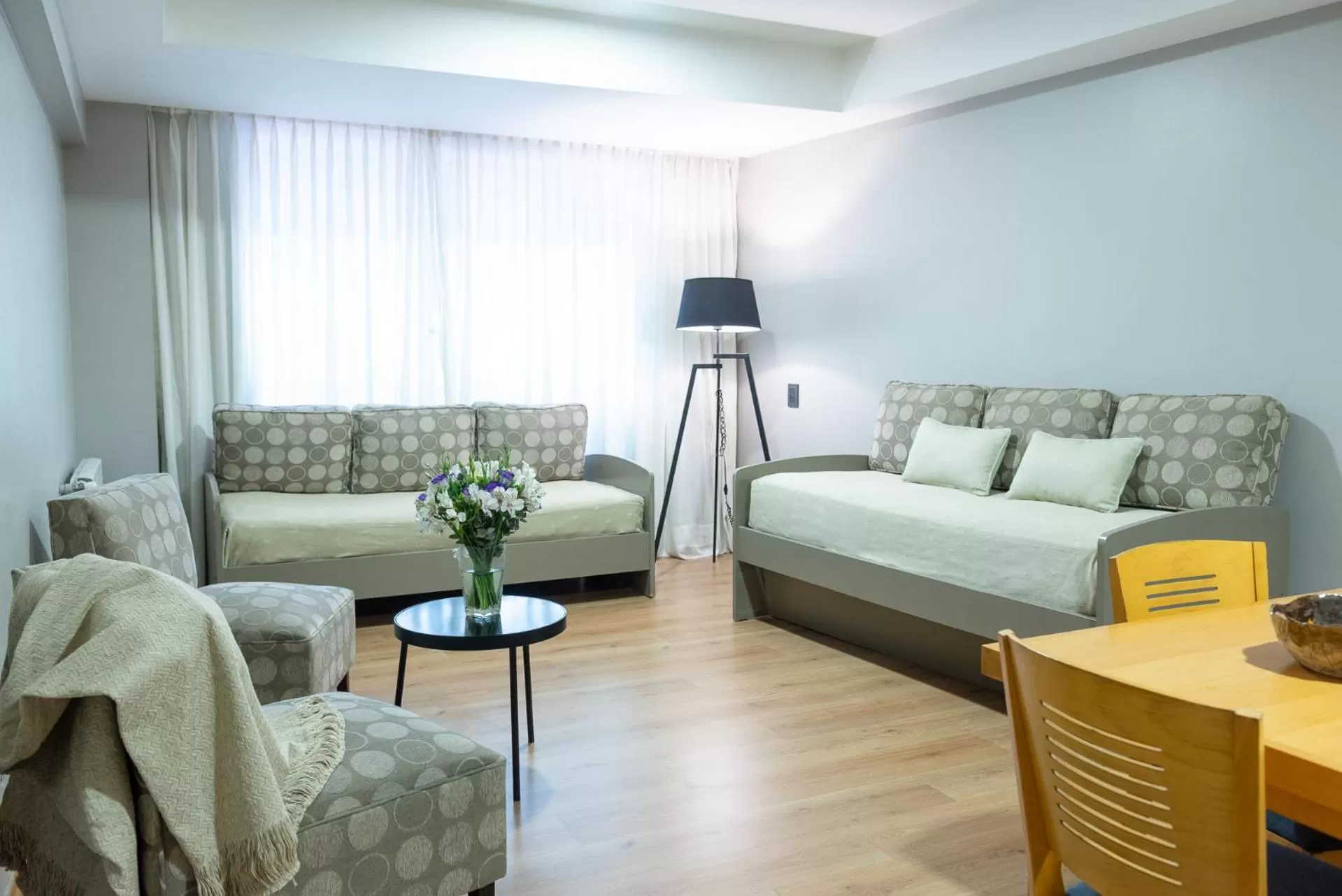 Bed in Portal Plaza Suites