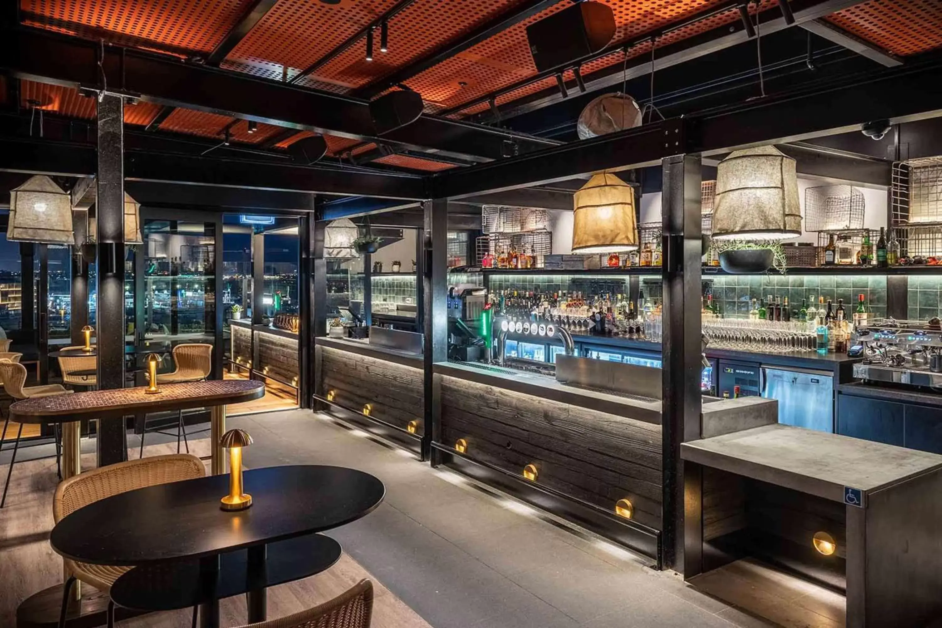 Lounge or bar in QT Auckland Lounge or bar in QT Auckland