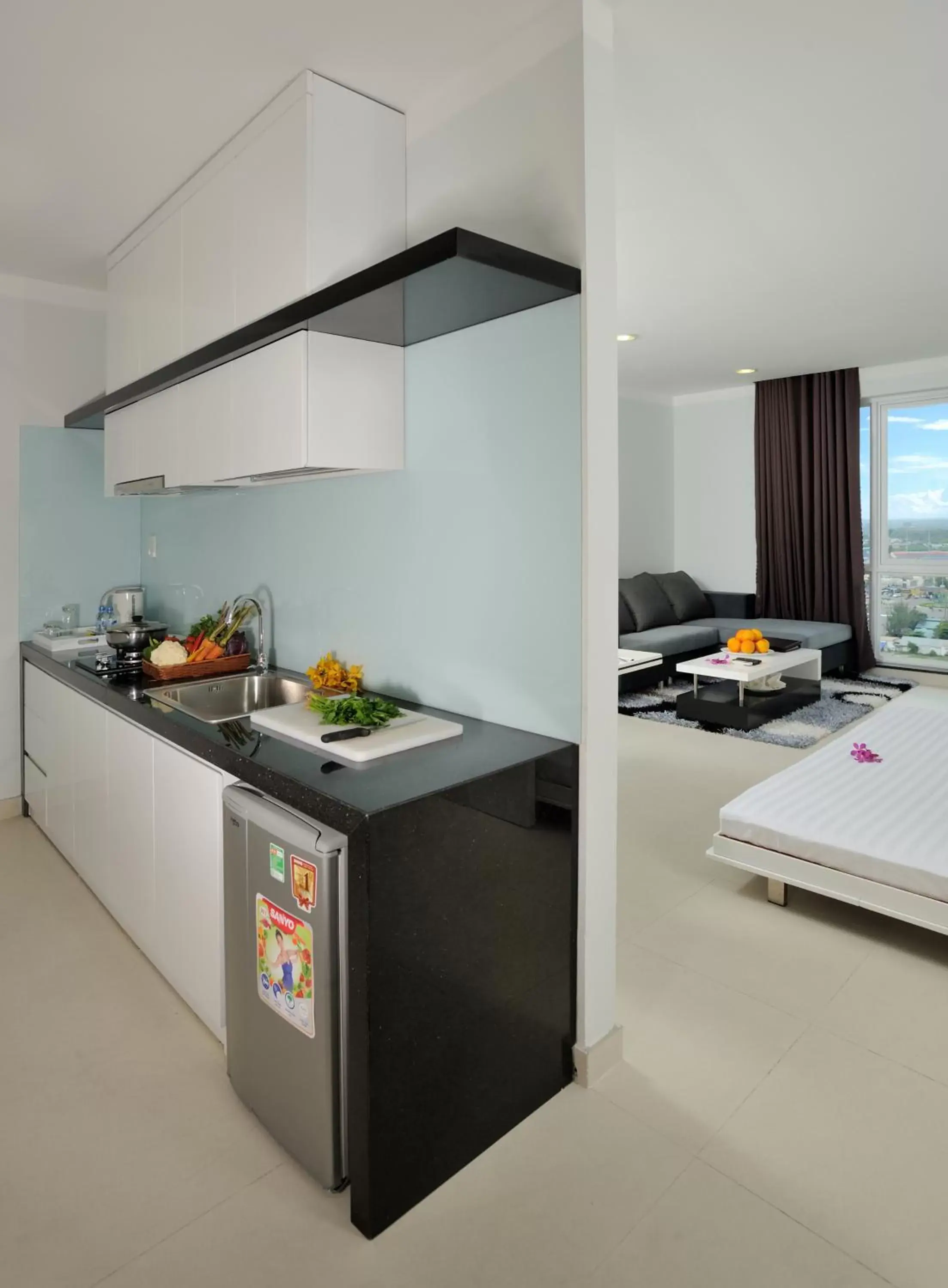 Kitchen or kitchenette, Kitchen/Kitchenette in Becamex Hotel Thu Dau Mot