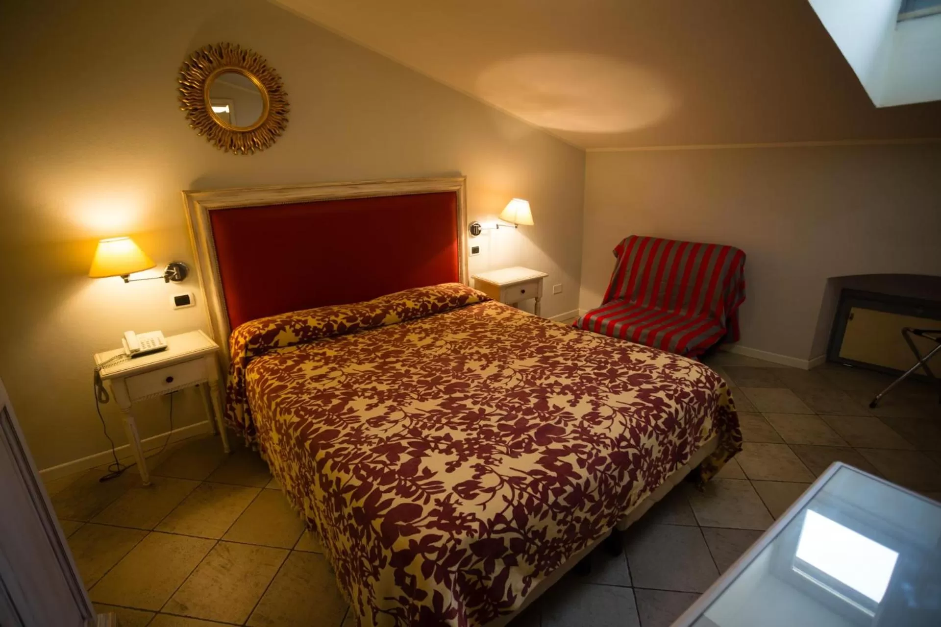 Decorative detail, Bed in Alessi Hotel Trattoria