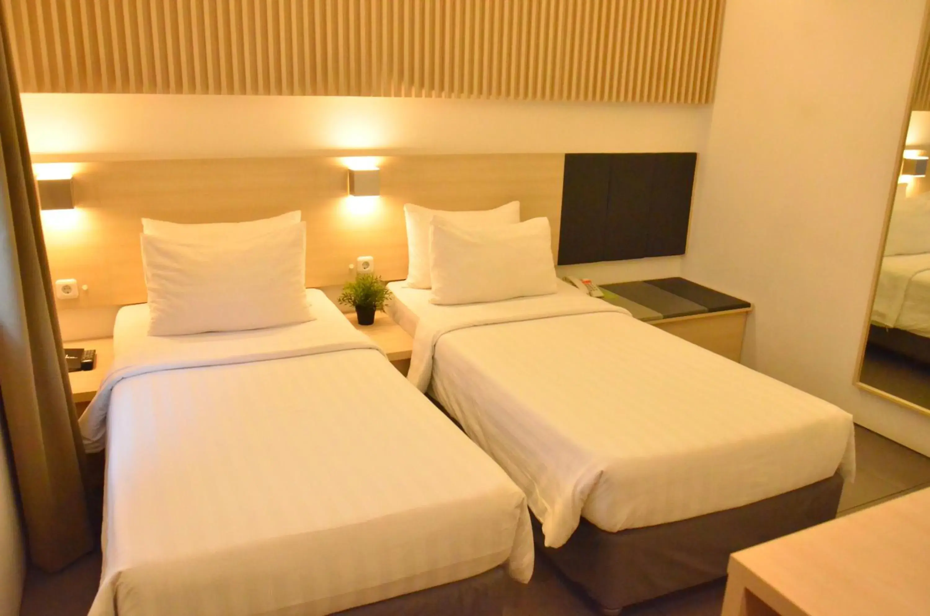 Bed in Malaka Hotel