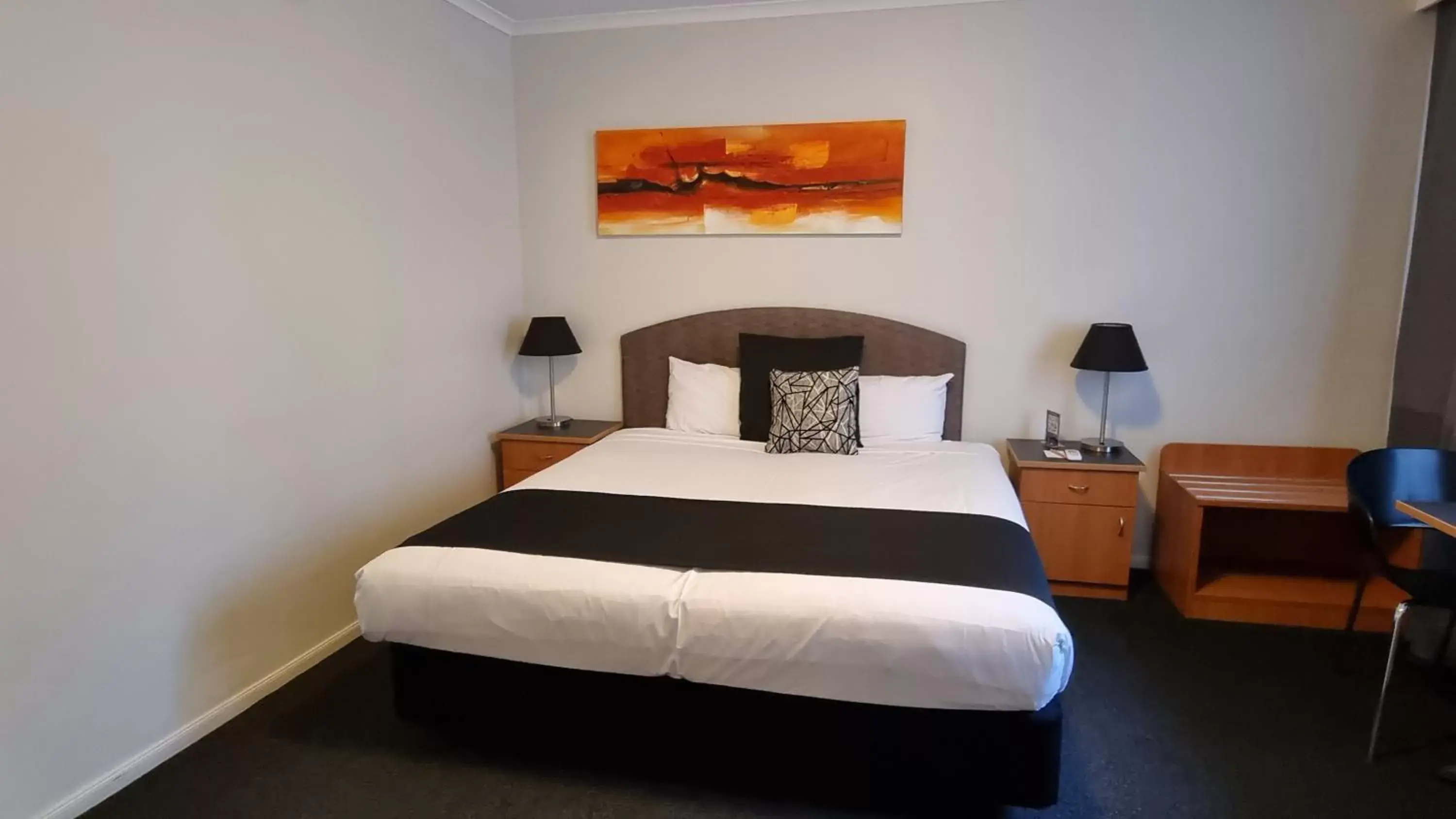 Bed in Alpha Hotel Canberra