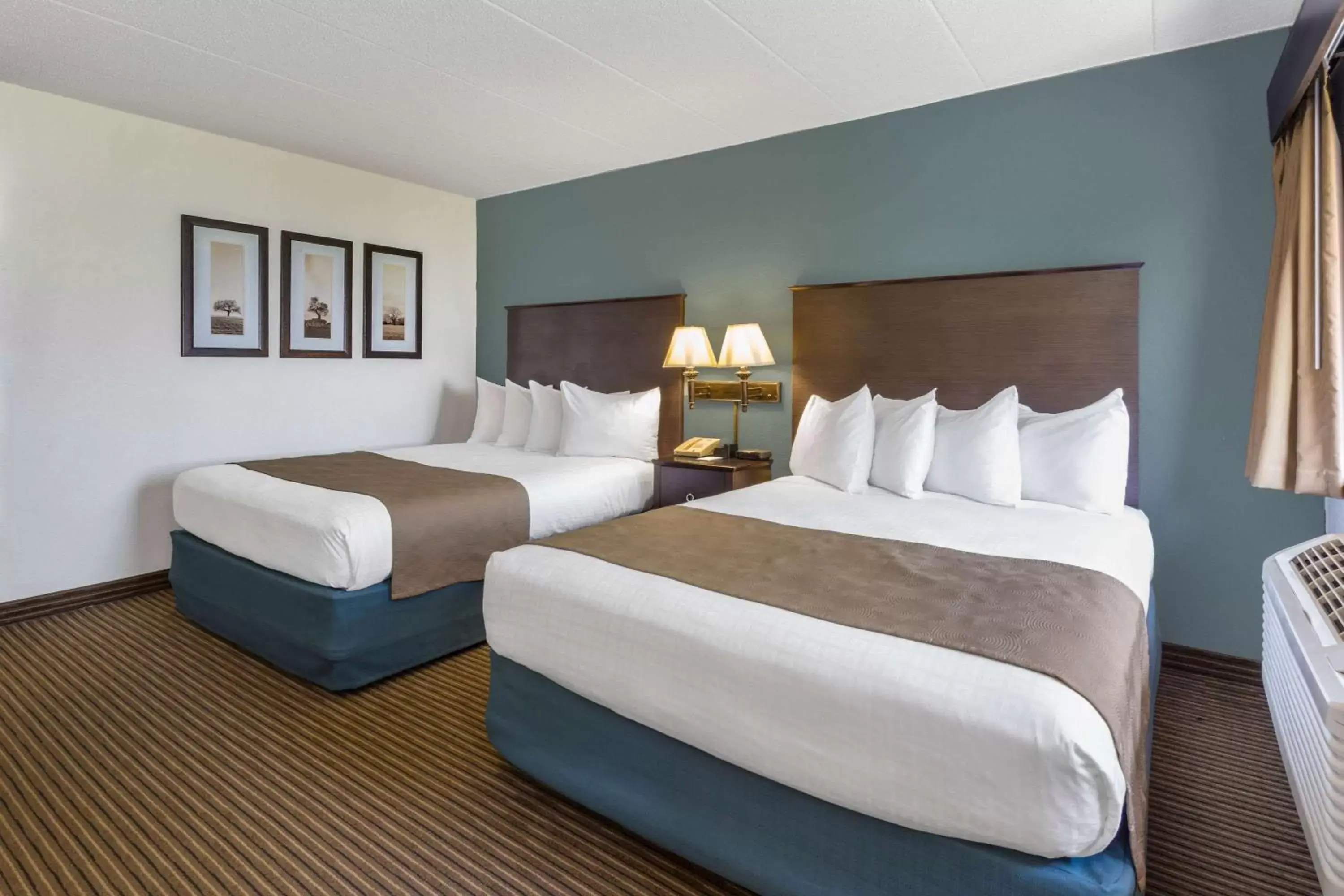 Photo of the whole room, Bed in AmericInn by Wyndham Menominee