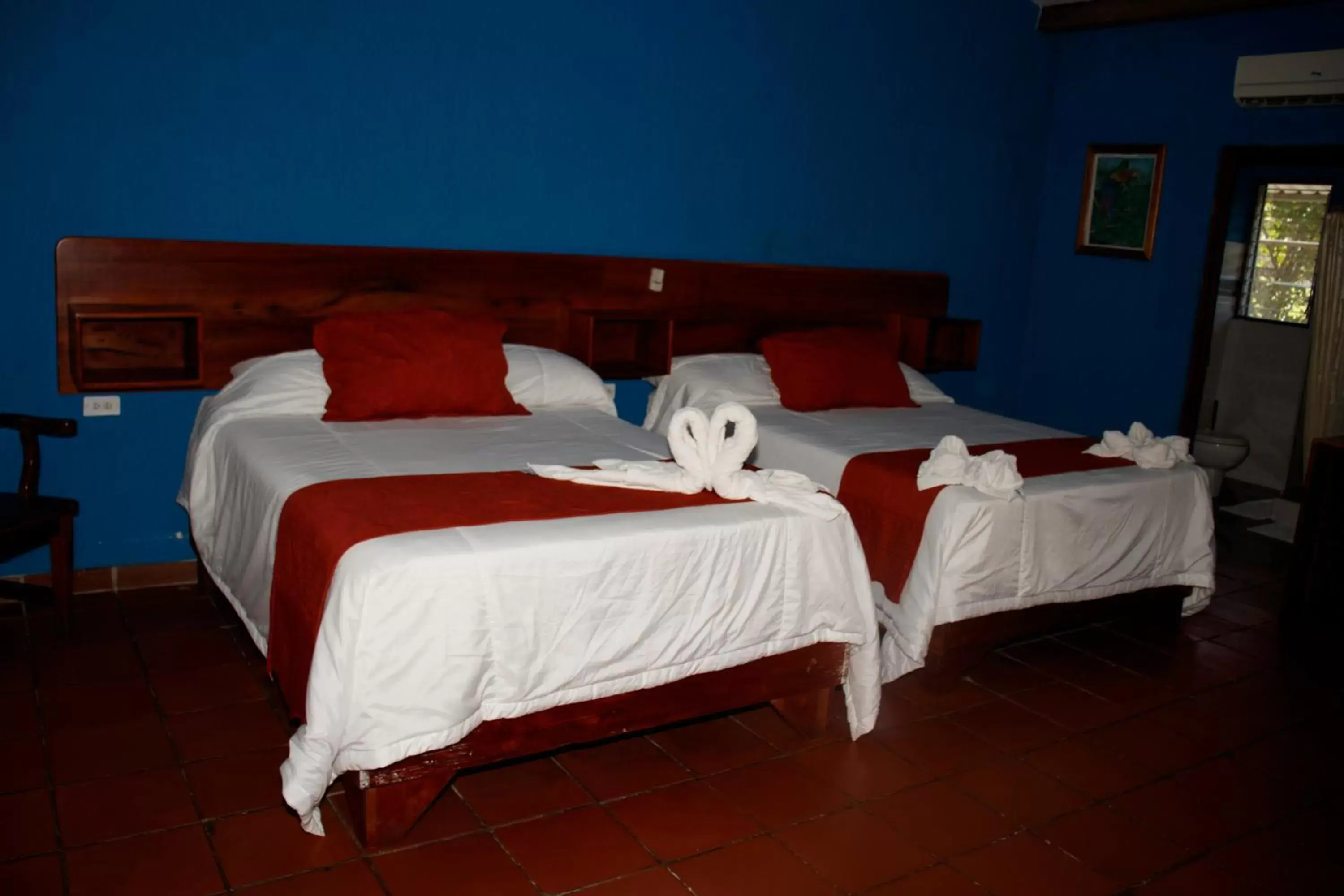 Photo of the whole room, Bed in Hotel Samoa del Sur