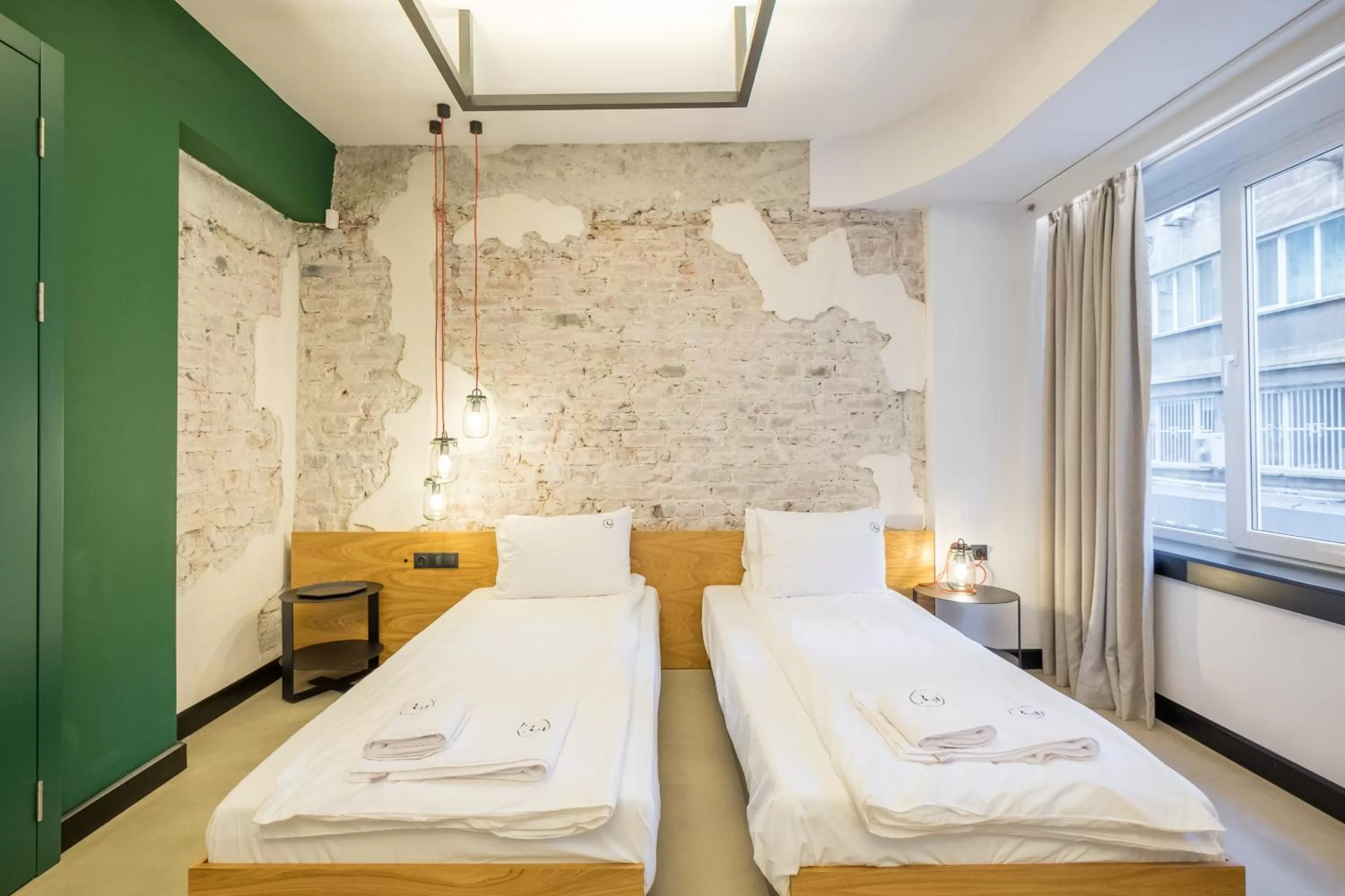 Bed in R34 Boutique Hotel