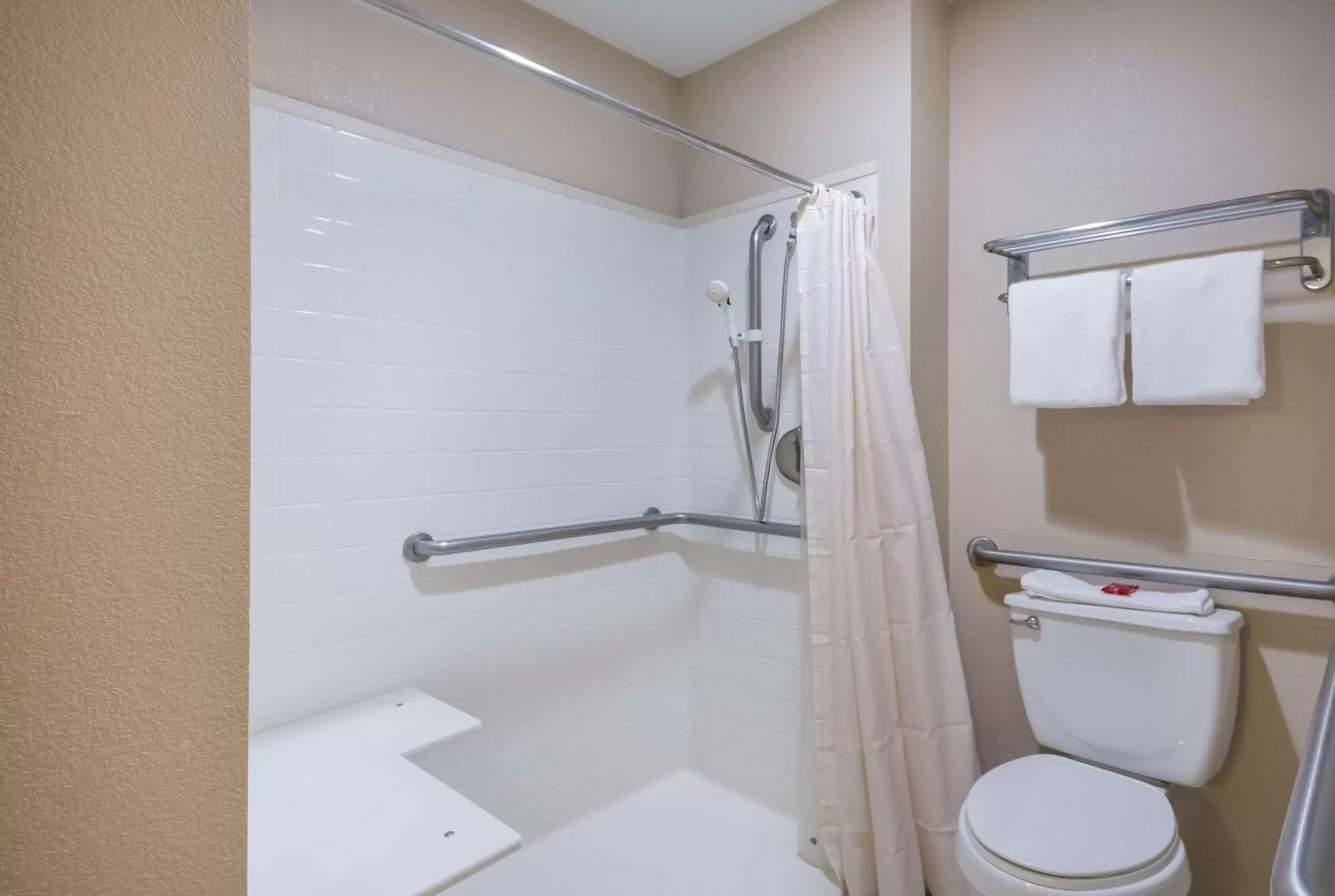 Bathroom in SureStay Hotel by Best Western Rockdale