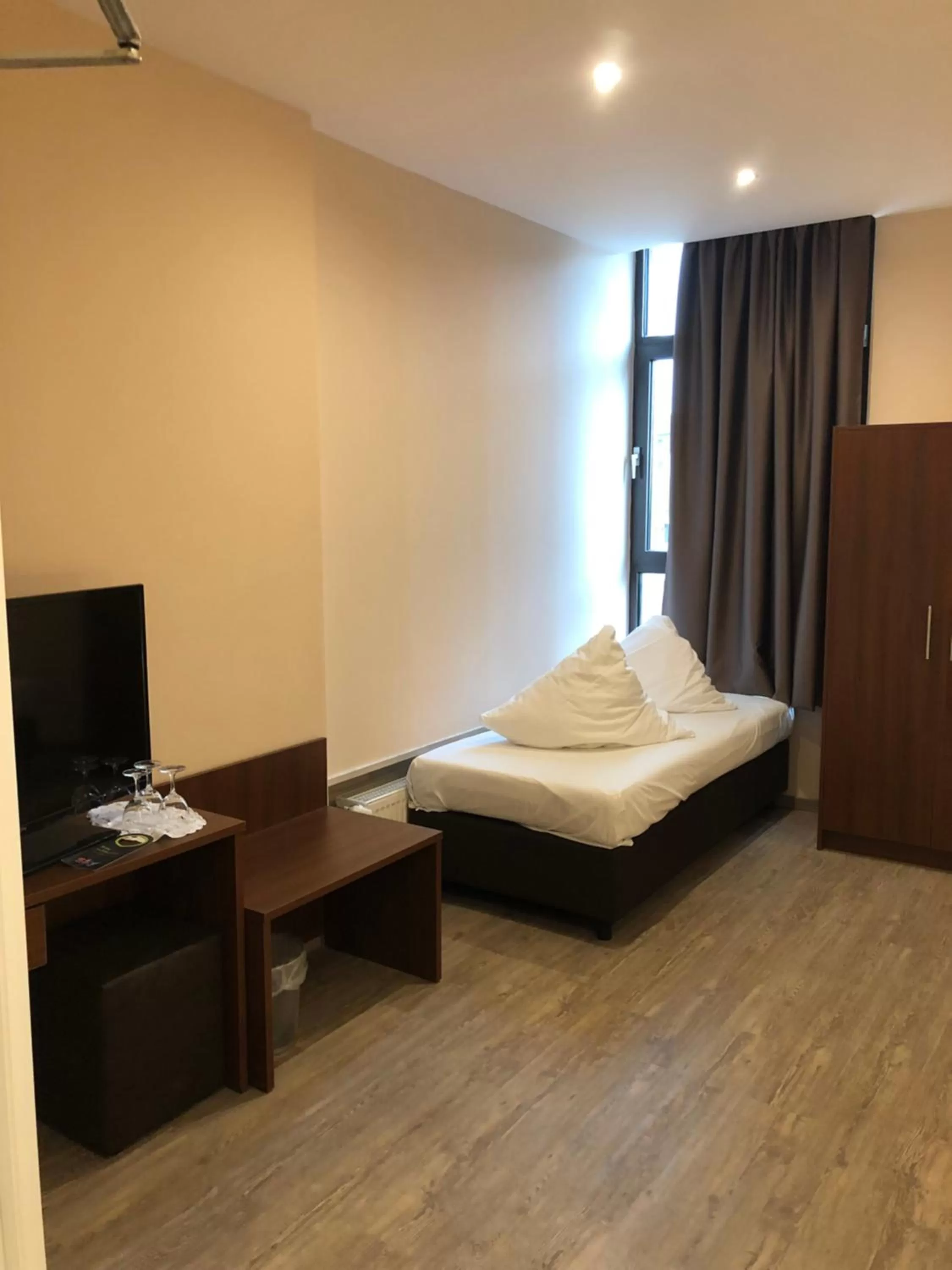 Bed in Hotel Poseidon