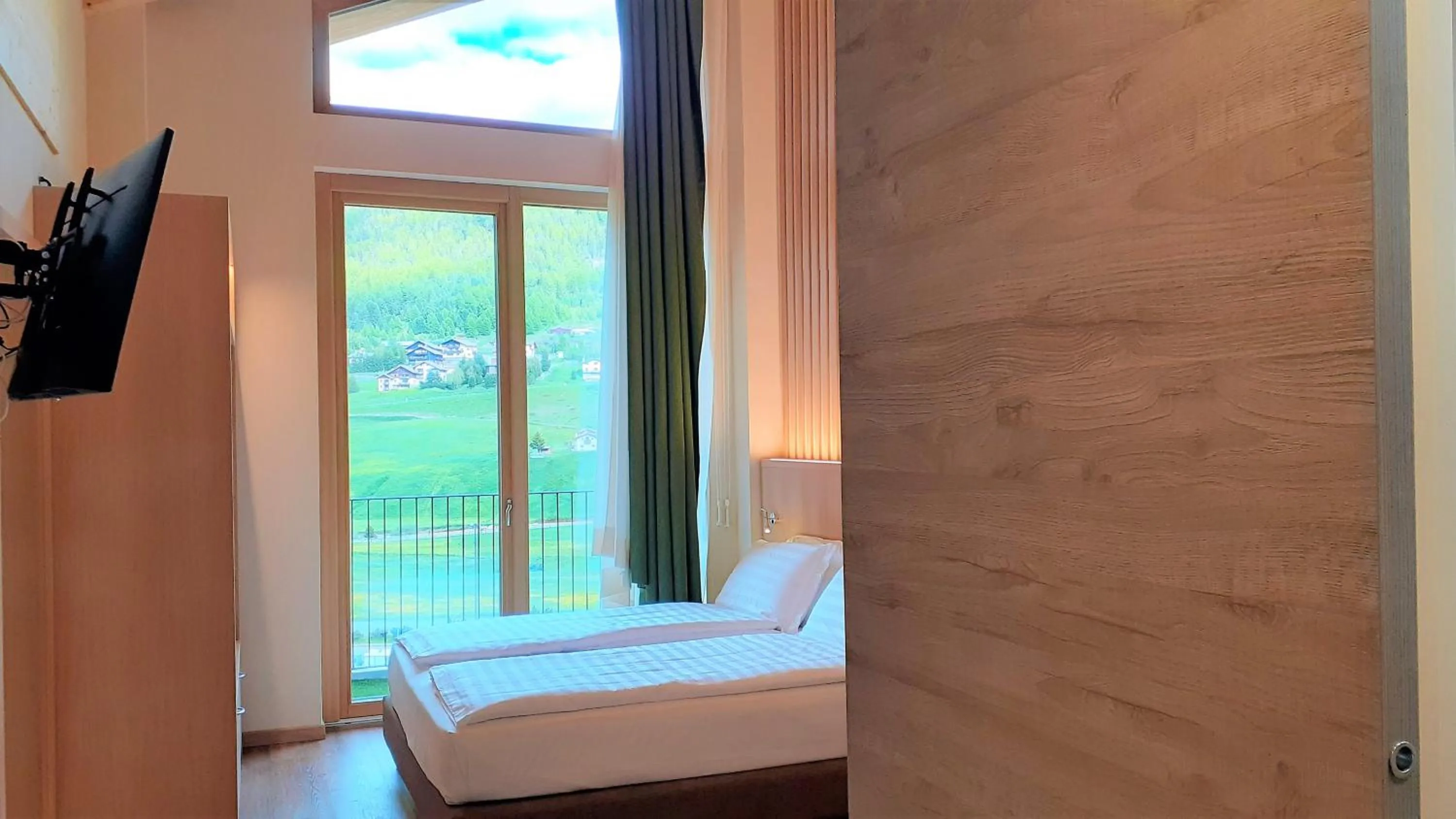 TV and multimedia, Bed in Livì Family Hotel