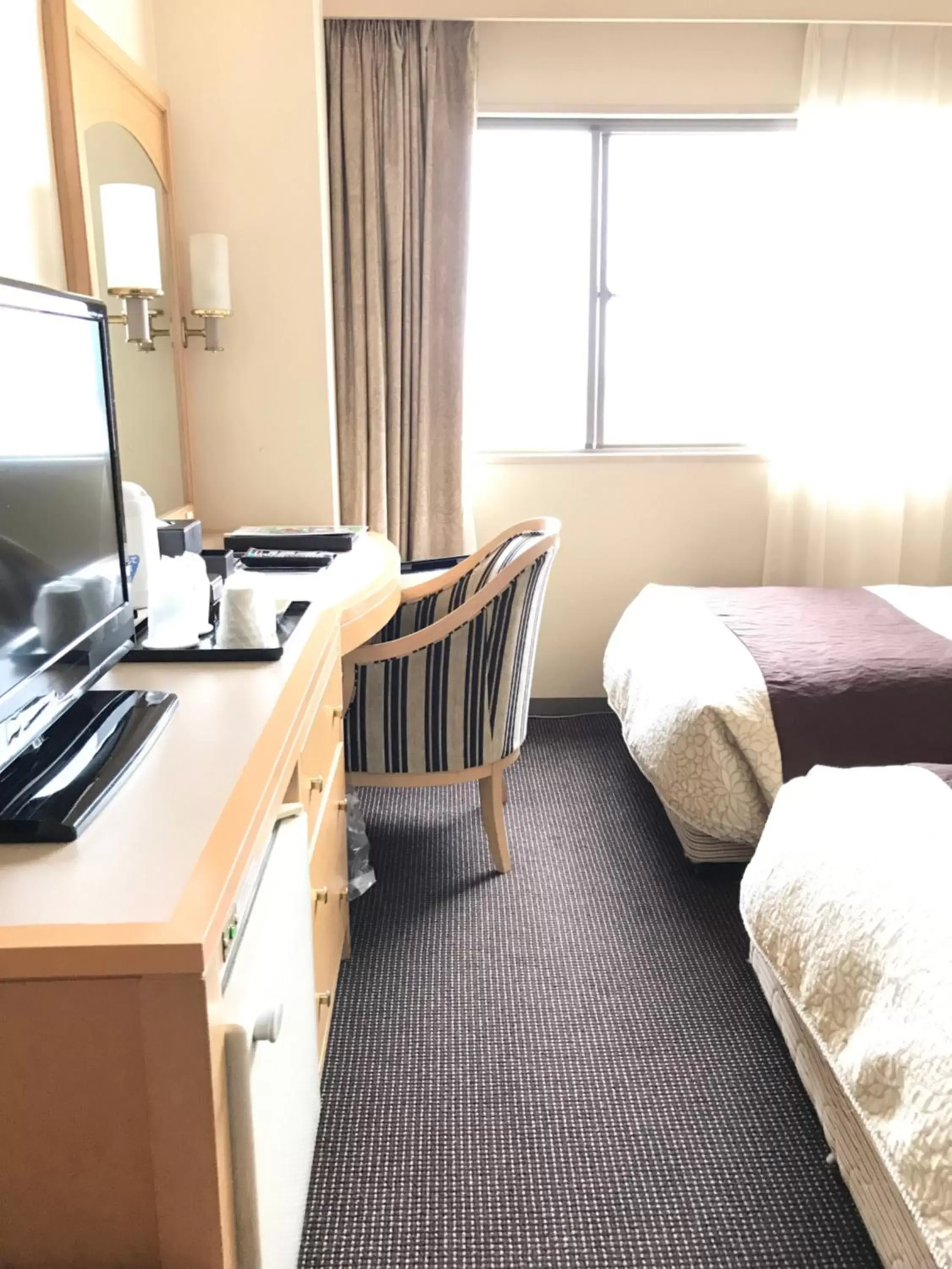 Bed in Numazu River Side Hotel