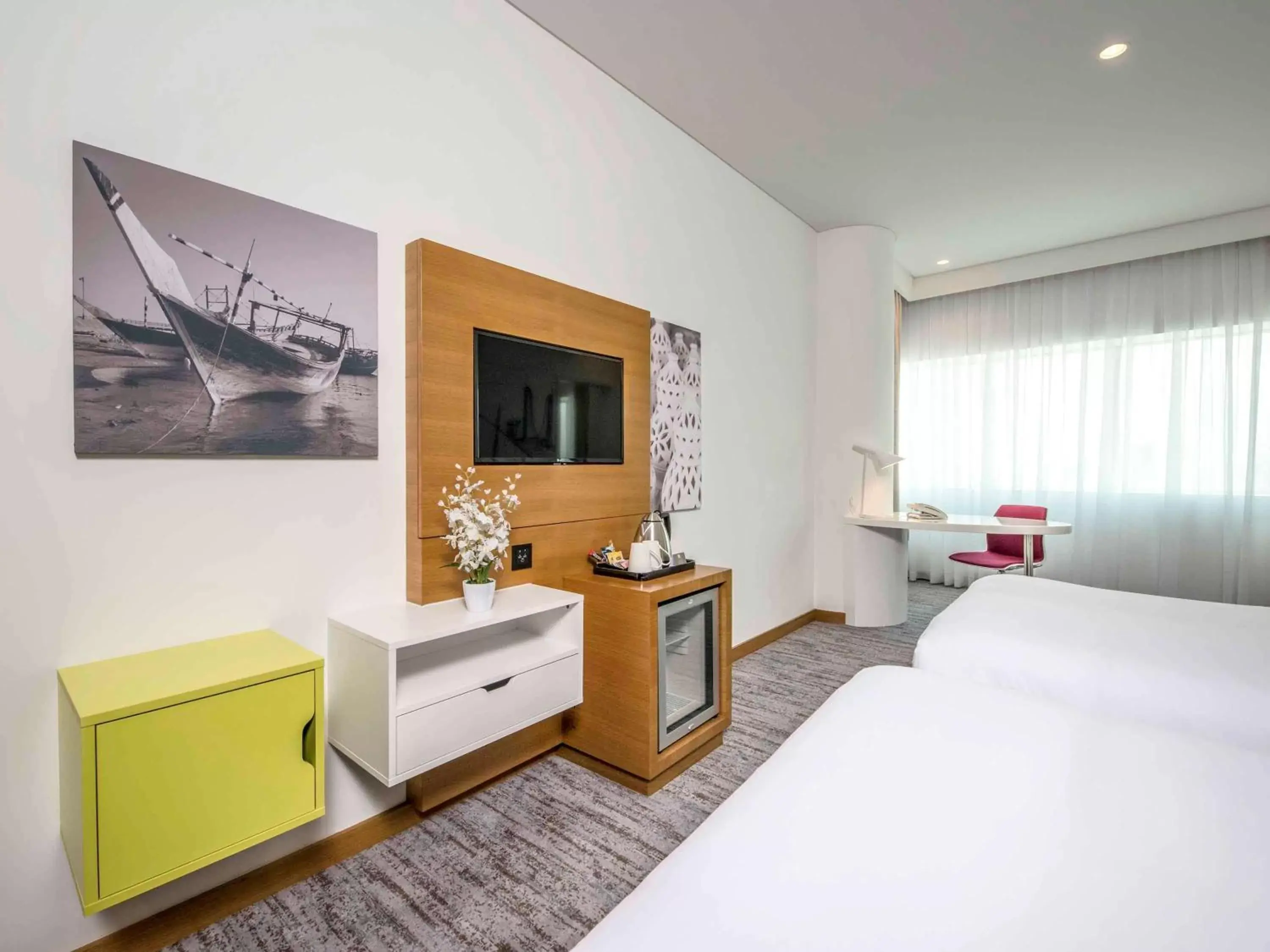 Photo of the whole room, TV/Entertainment Center in ibis Styles Manama Diplomatic Area