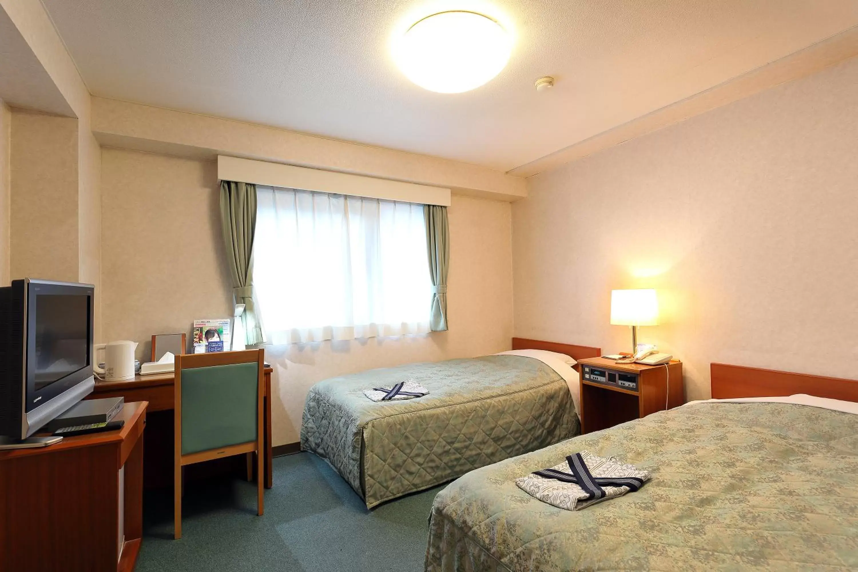 Bed in Hotel Tateshina
