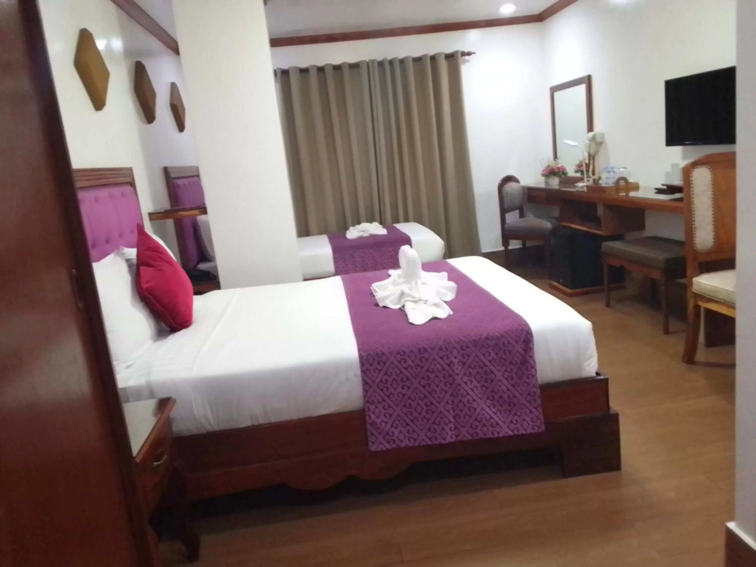 Communal lounge/ TV room, Bed in CLN Boutique Hotel