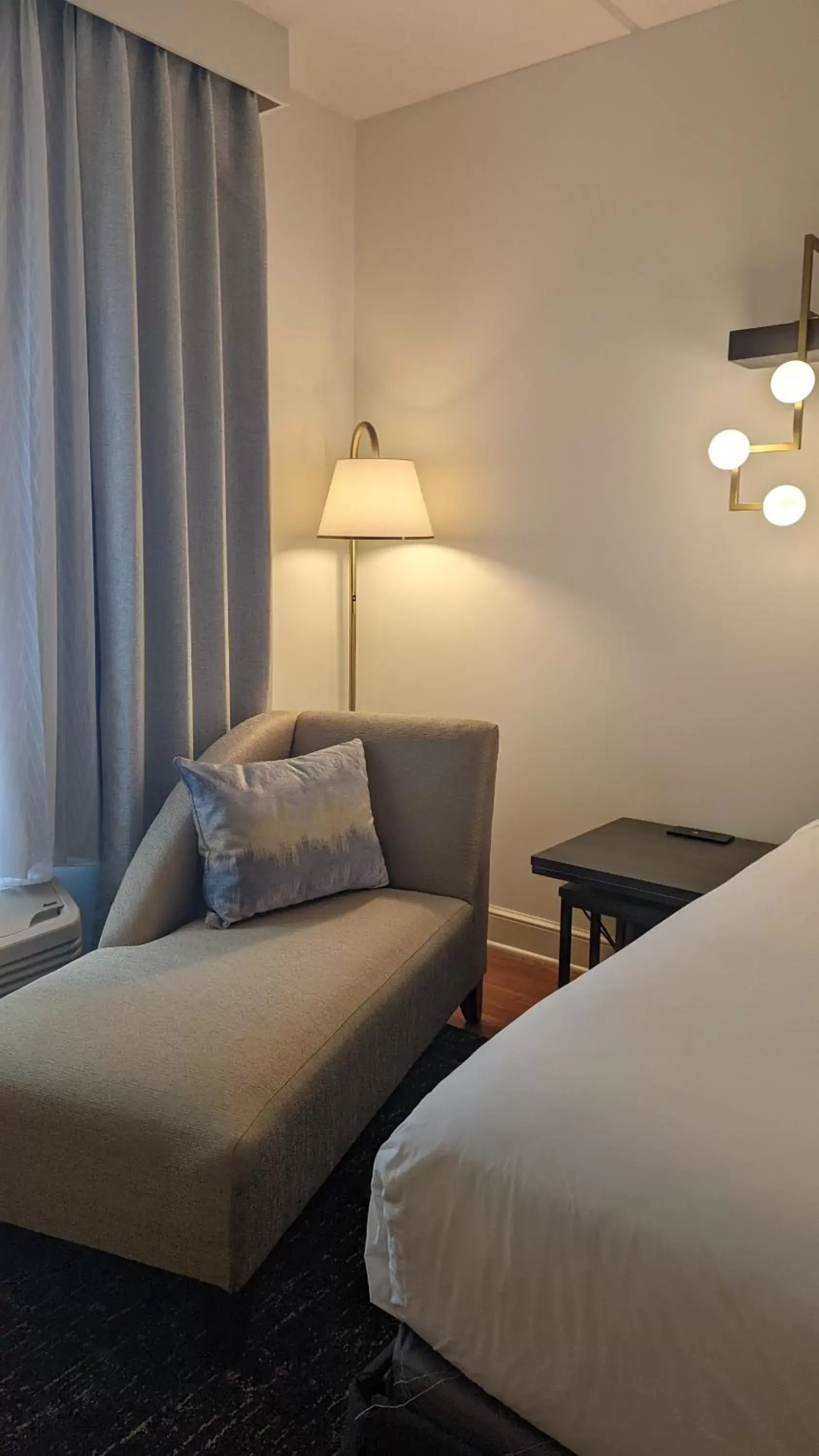 Seating area, Bed in Hotel Indigo Jacksonville-Deerwood Park, an IHG Hotel