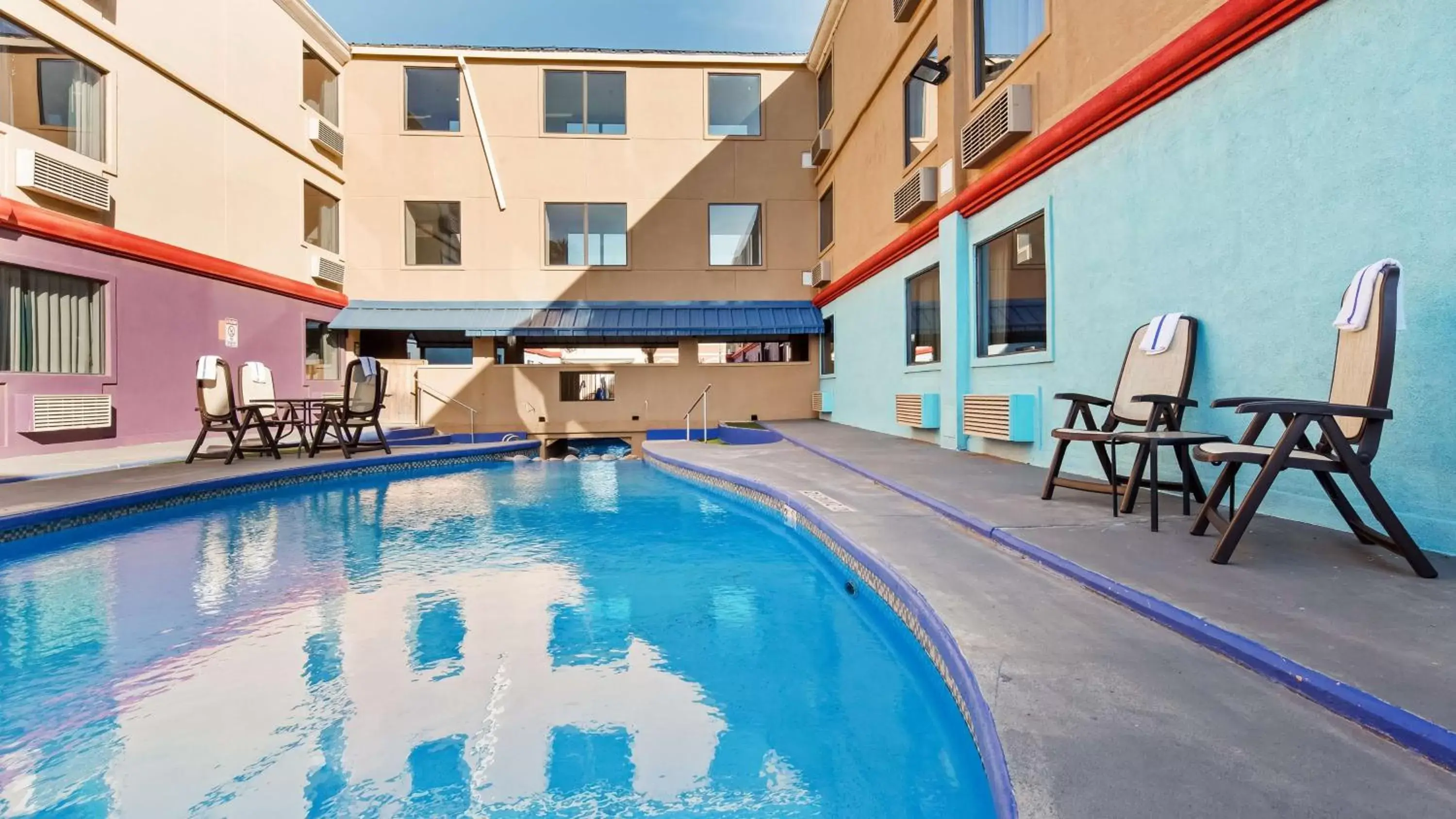 Pool view, Swimming Pool in SureStay Plus Hotel by Best Western Lubbock Medical Center
