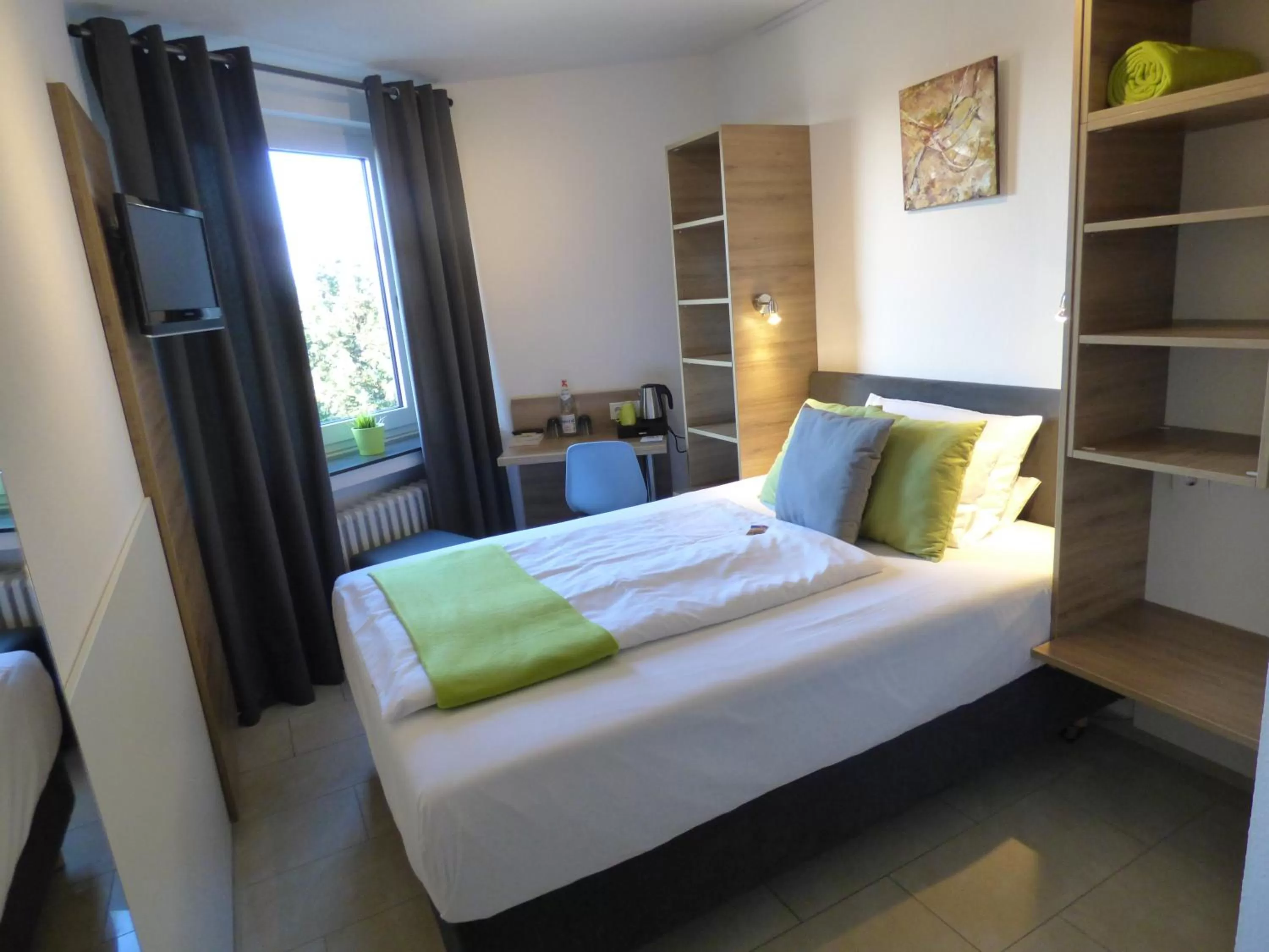 Bed in Hotel Art Inn Dinslaken