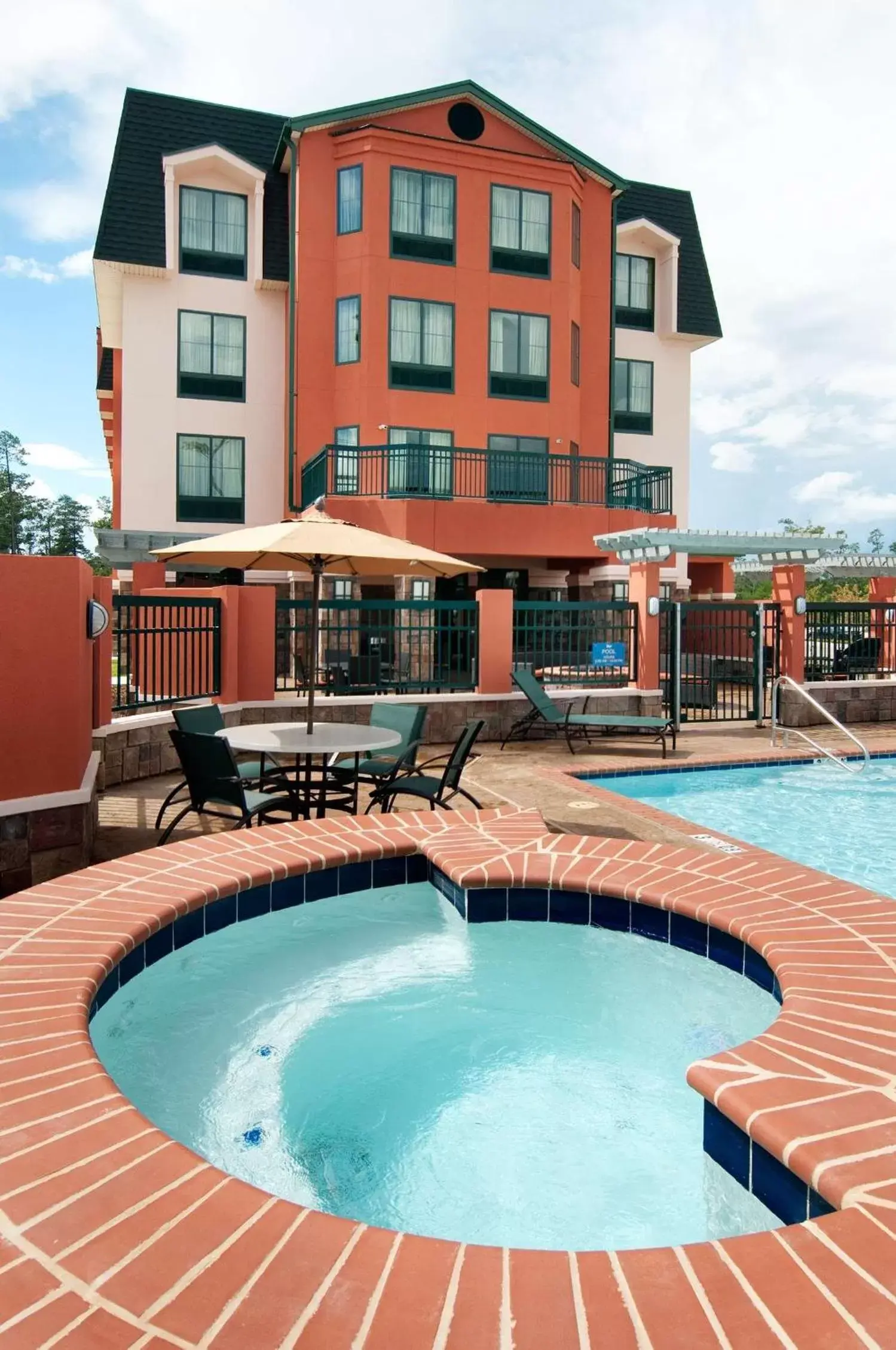 Pool view, Property Building in Homewood Suites by Hilton Slidell