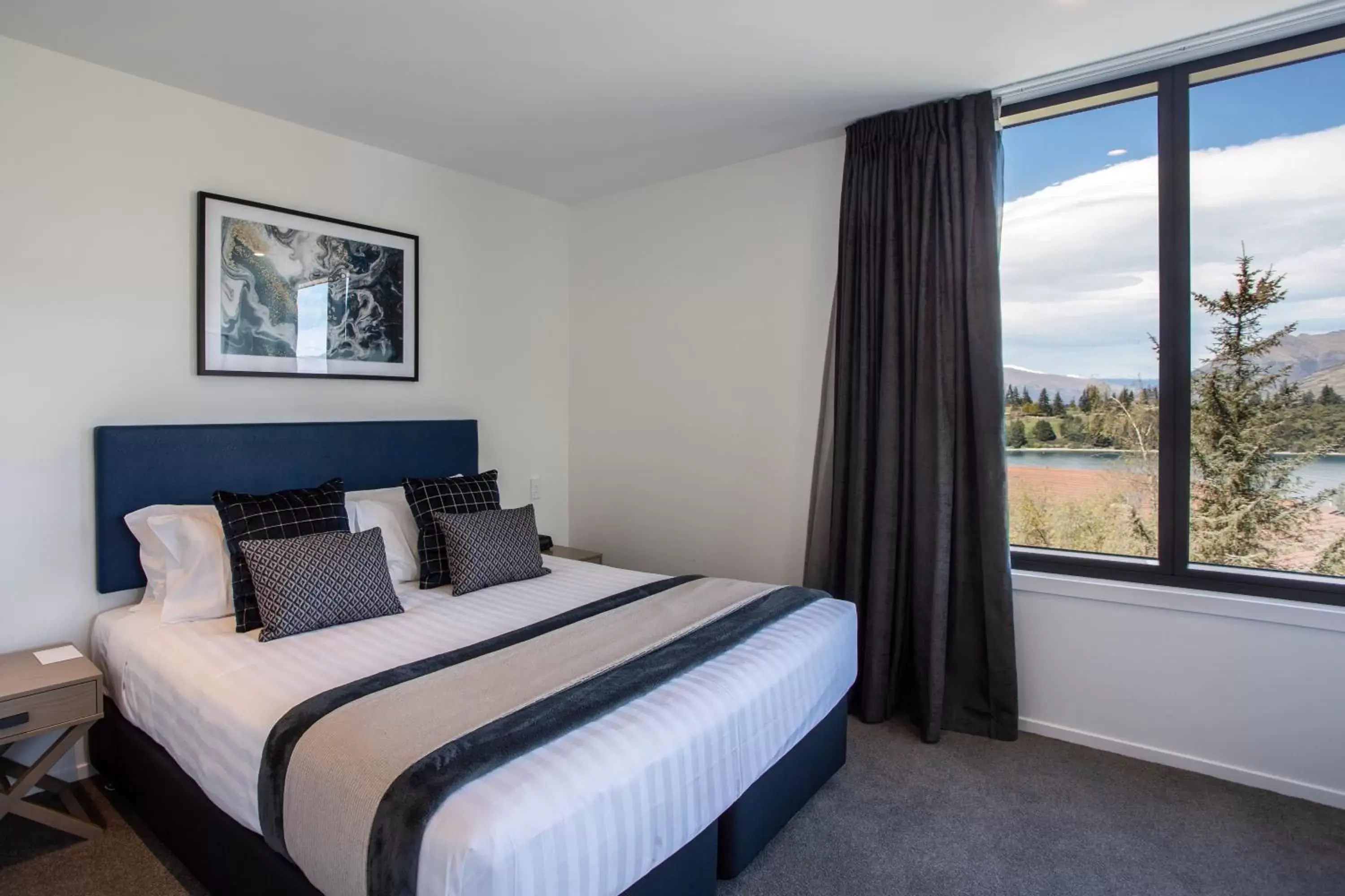 Bed in Ramada Queenstown Central