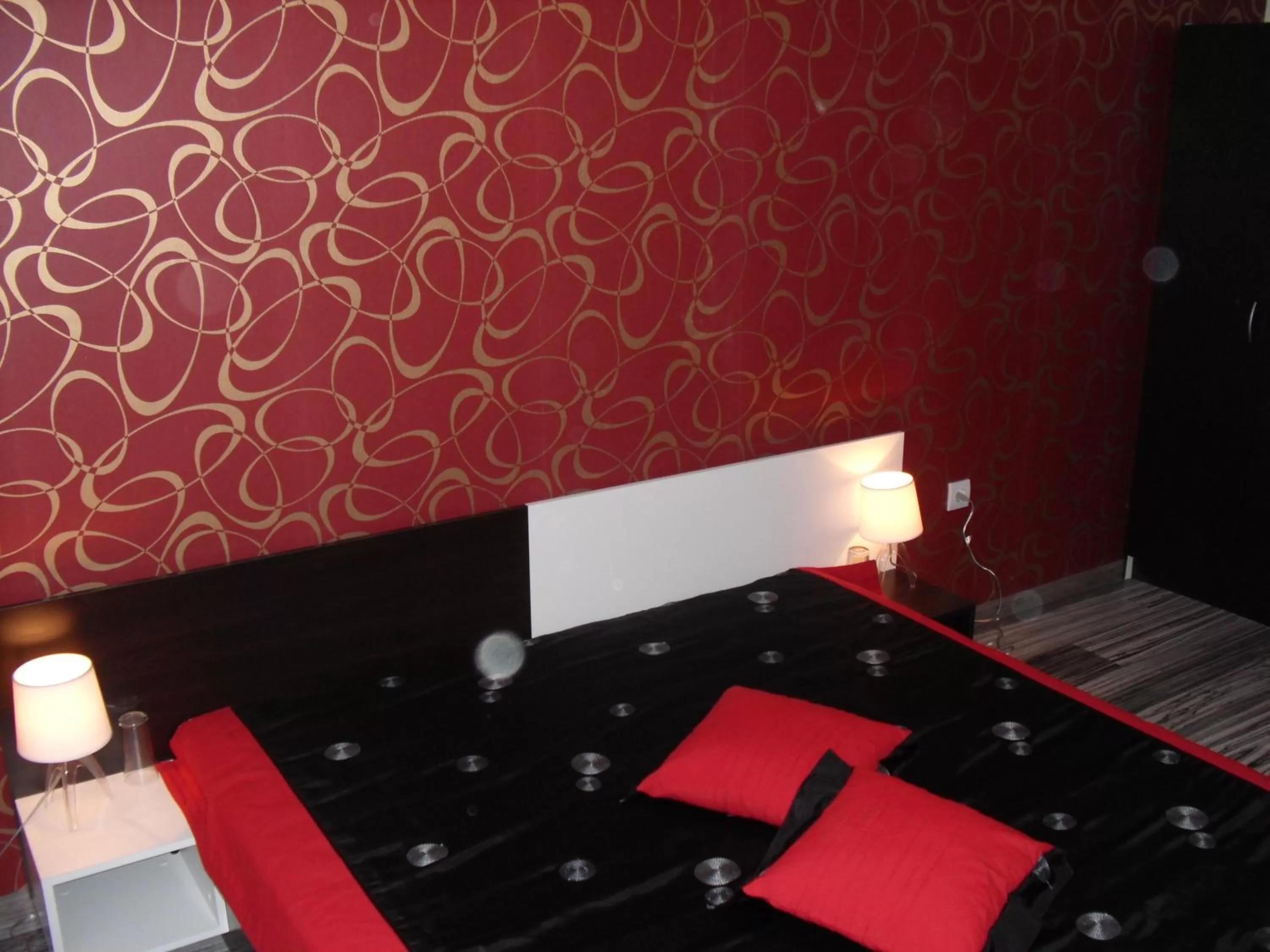 Bed in Family Hotel Malibu