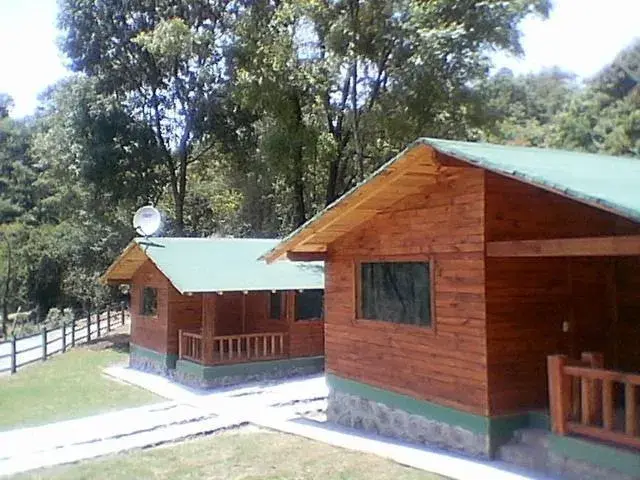 Facade/entrance, Property Building in Cabañas El Estribo Hotel