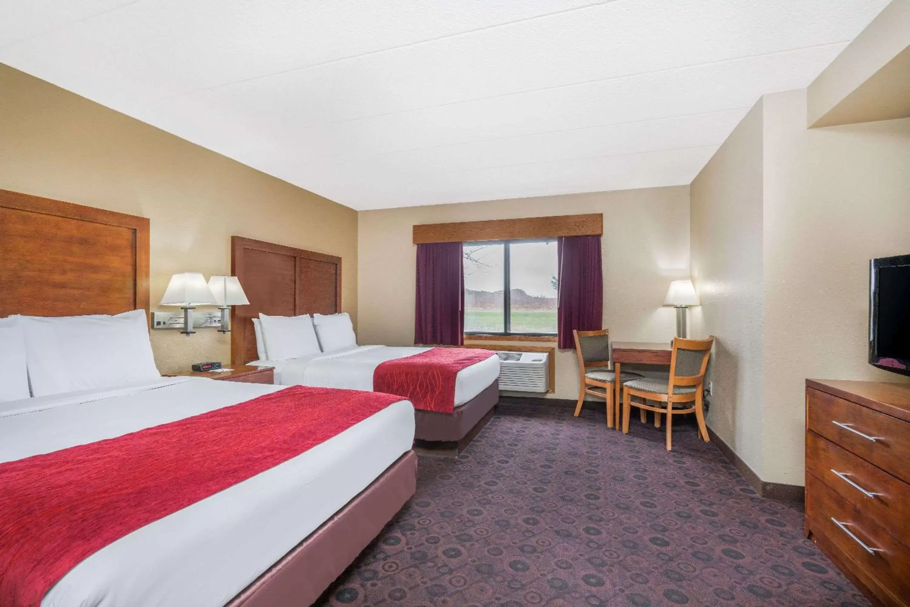 Photo of the whole room, Bed in Baymont by Wyndham Kasson Rochester Area