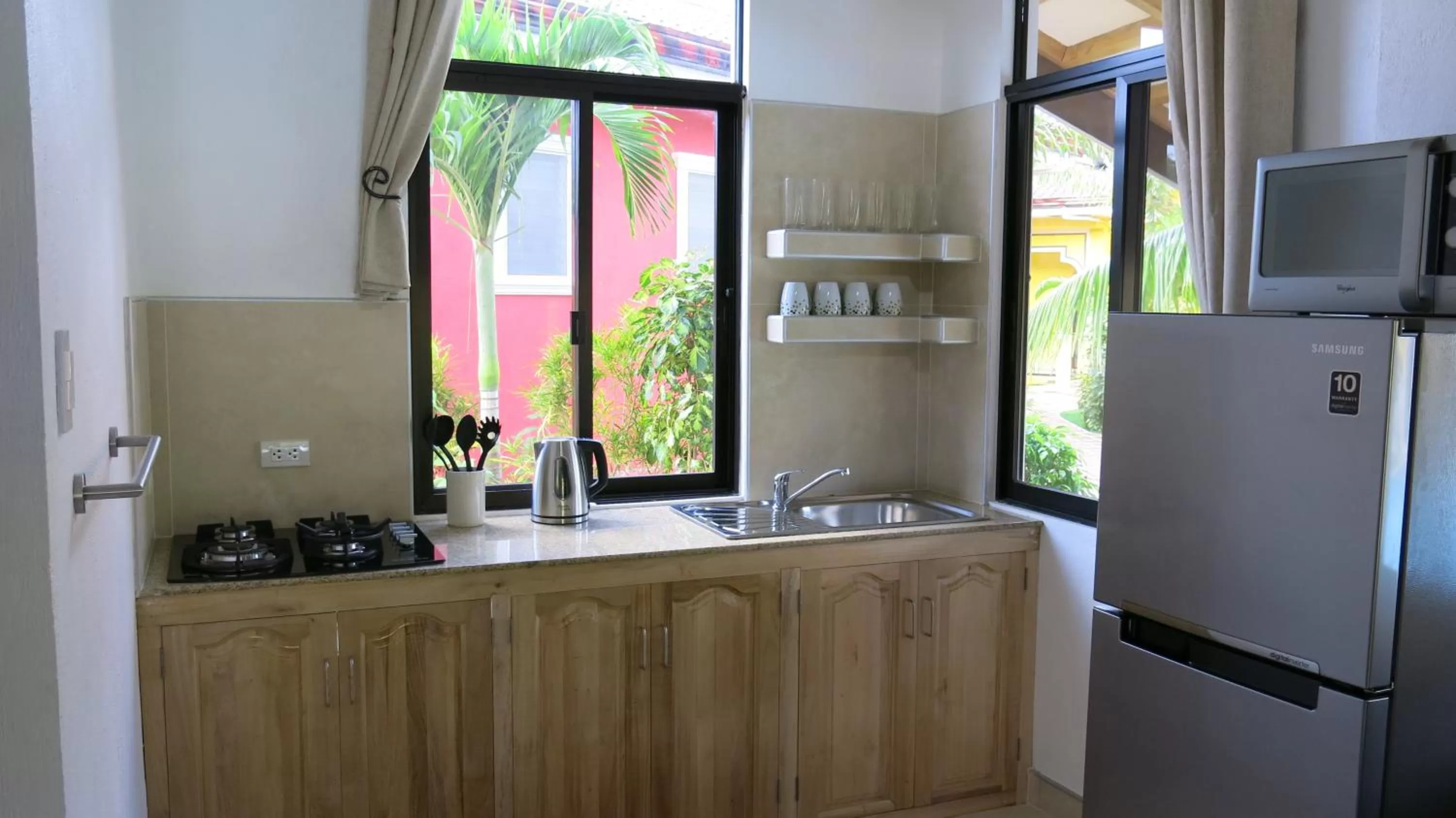 Kitchen or kitchenette in Alona's Coral Garden Resort (Adult-Only)