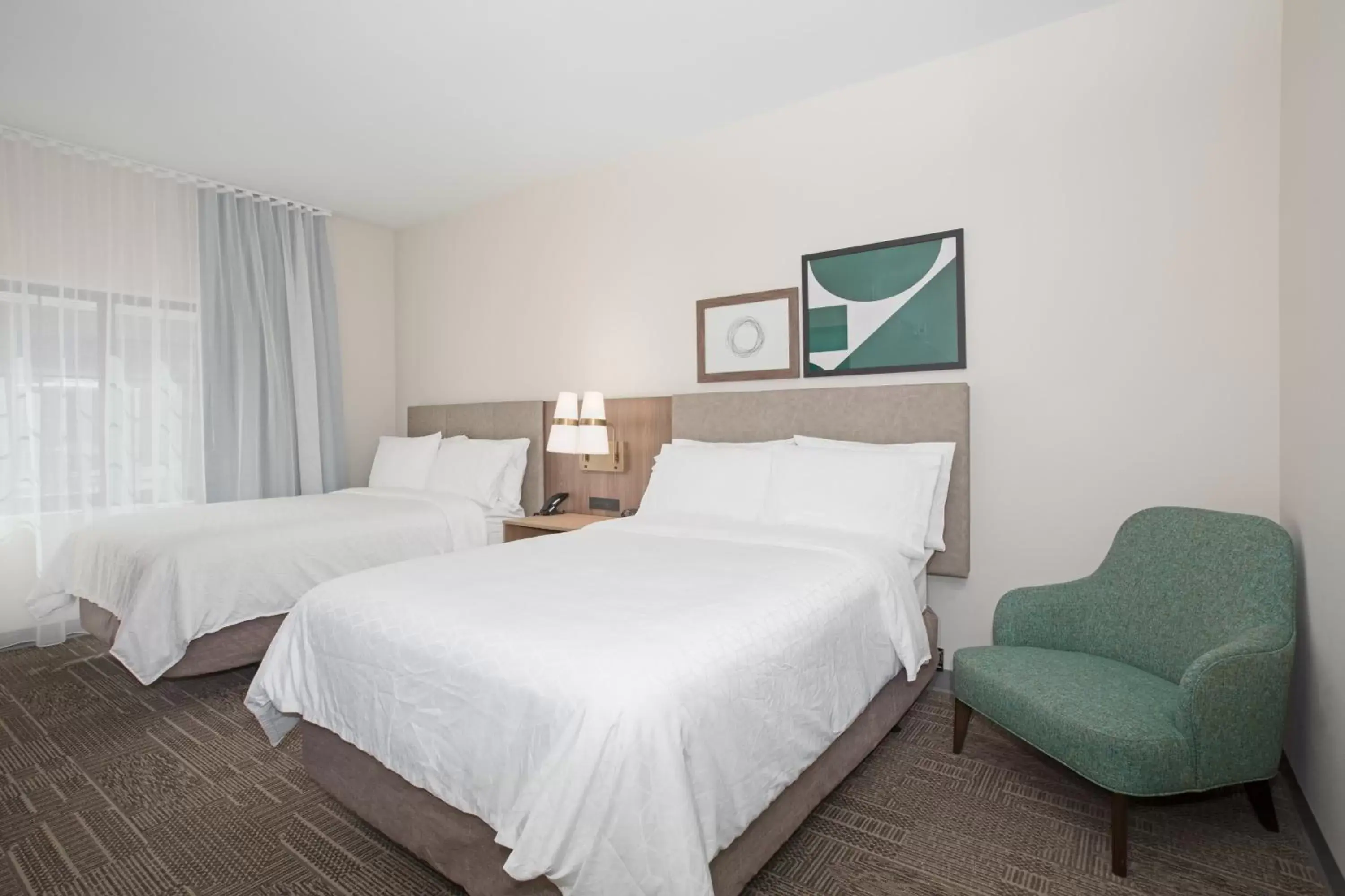 Photo of the whole room, Bed in Staybridge Suites - Carson City - Tahoe Area, an IHG Hotel