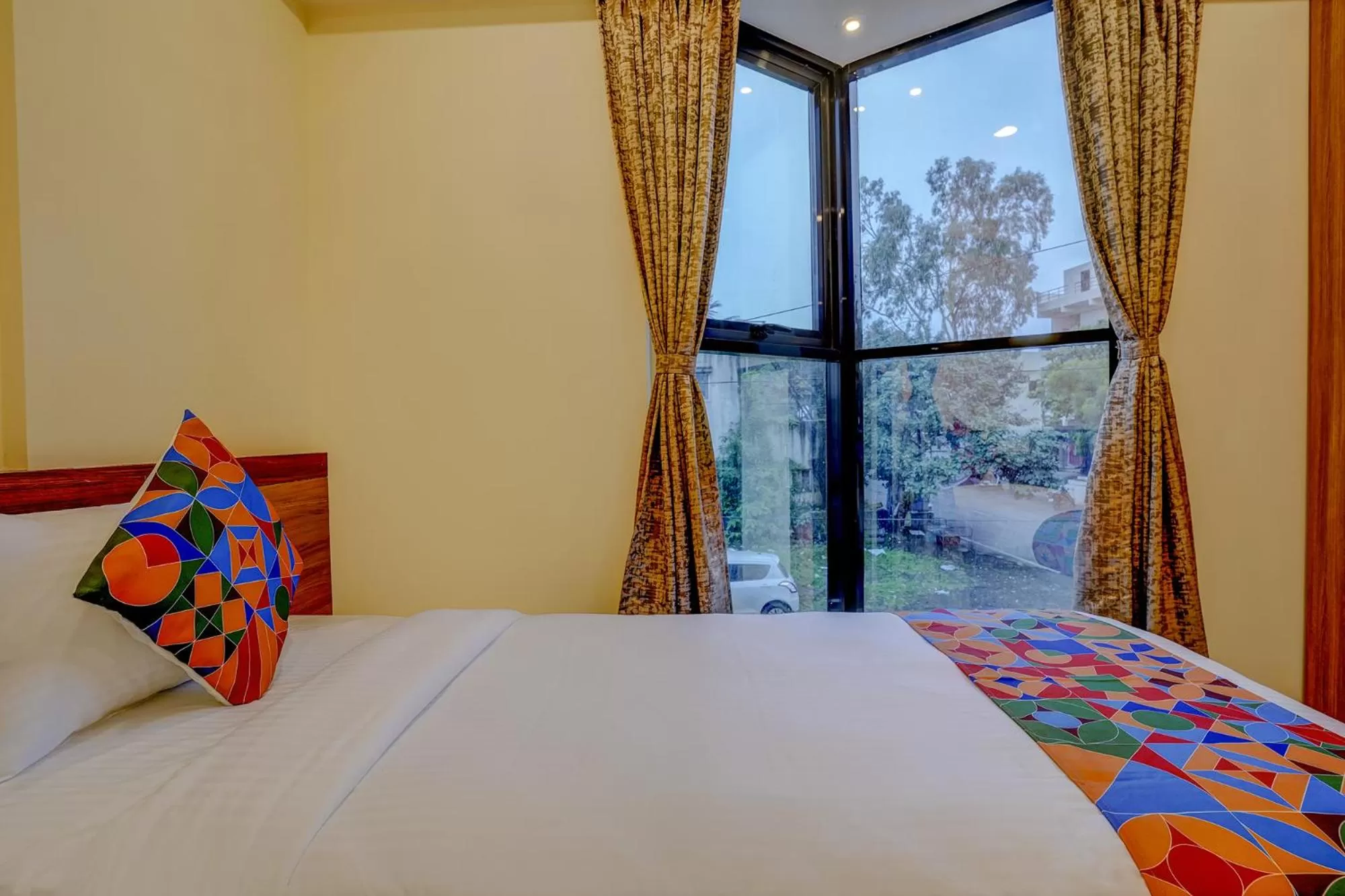 Bed in FabHotel Crystal Homes - nr Rajaram Bhiku stadium